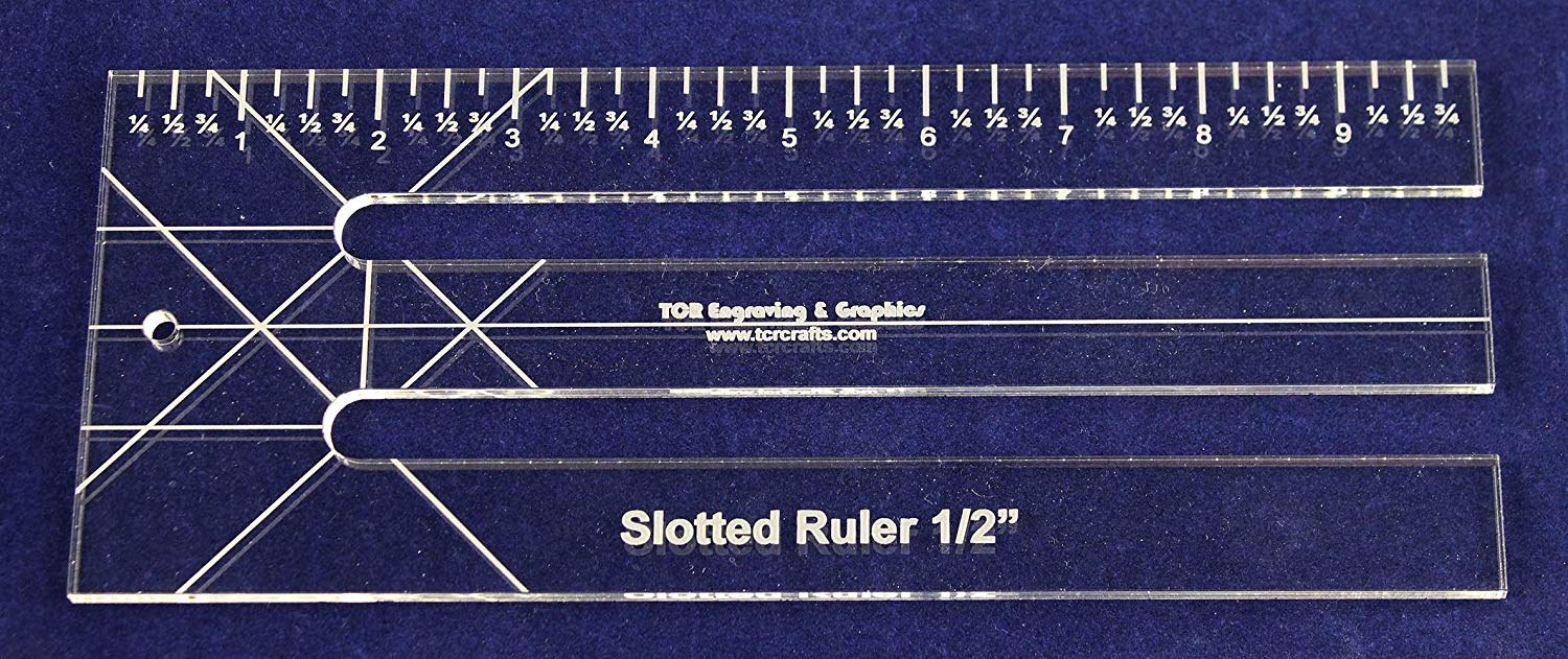 Clear acrylic slotted quilting ruler