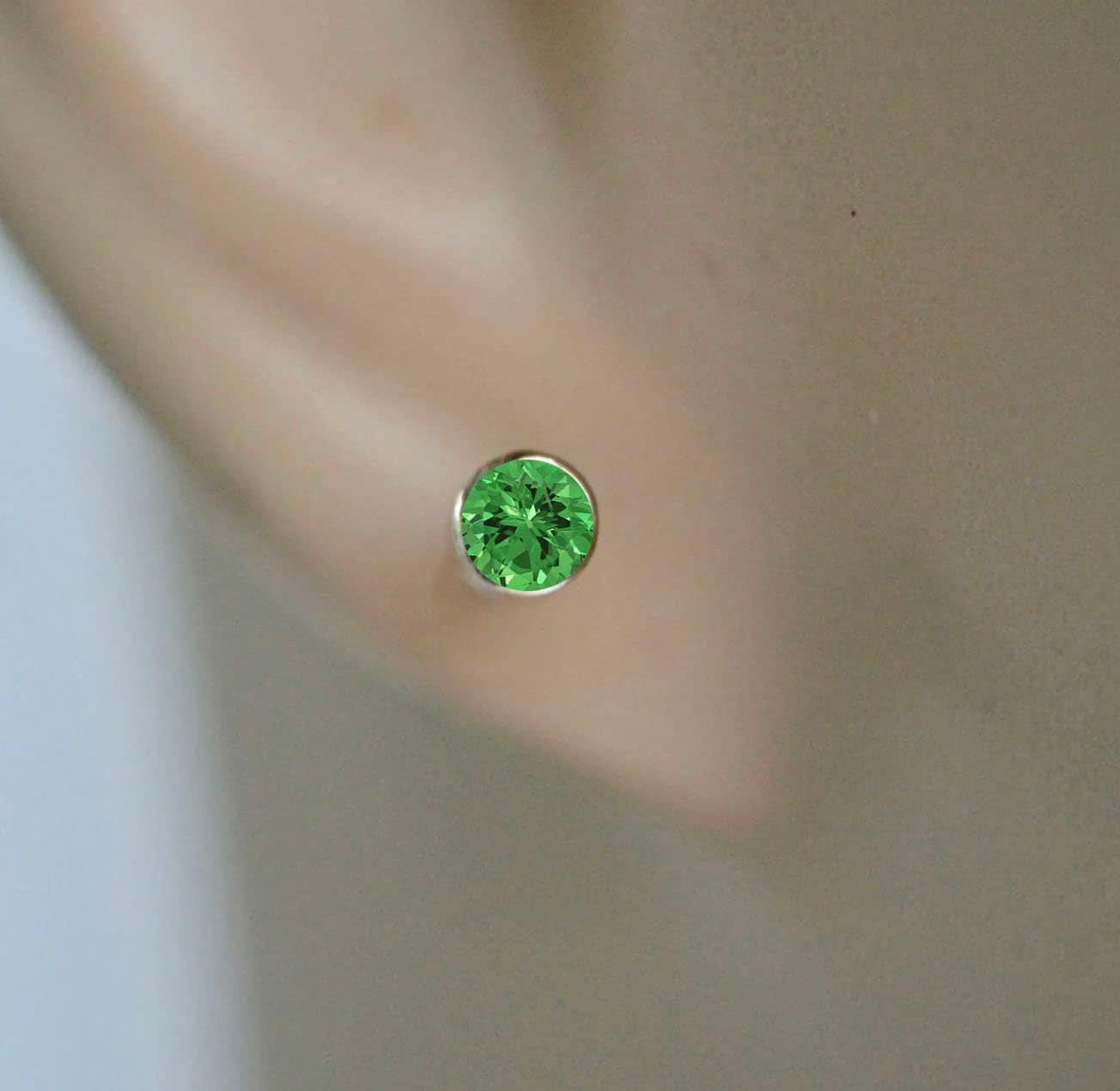 Tiny Tsavorite Garnet Stud Earrings 14kt Gold, January Birthstone, detail view