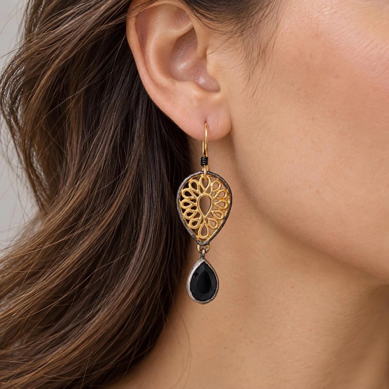Black Onyx Gold Tone Dangly Teardrop Filigree Earrings, worn view