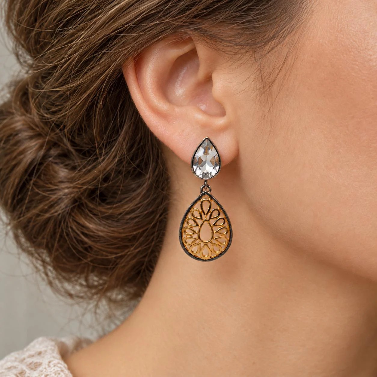 Clear Quartz Teardrop Gold Tone Dangly Filigree Earrings, worn view