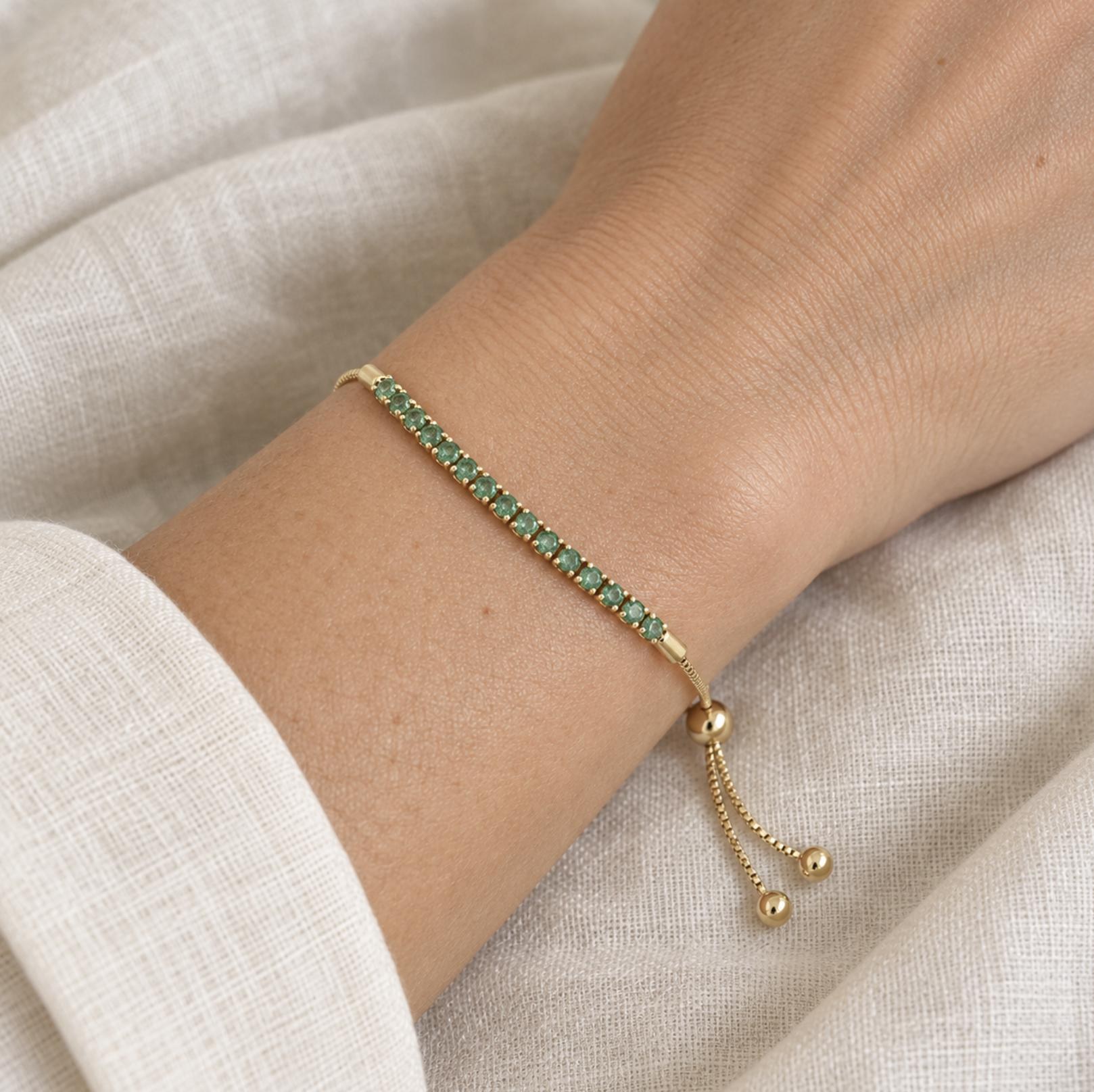 Natural Emerald Adjustable Bolo Bracelet Solid 14k Gold : 20th and 35th Anniversary Gift for Wife, worn view