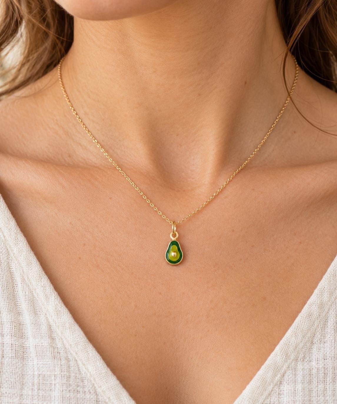 14k Gold Avocado Charm for Bracelet or Necklace, worn view