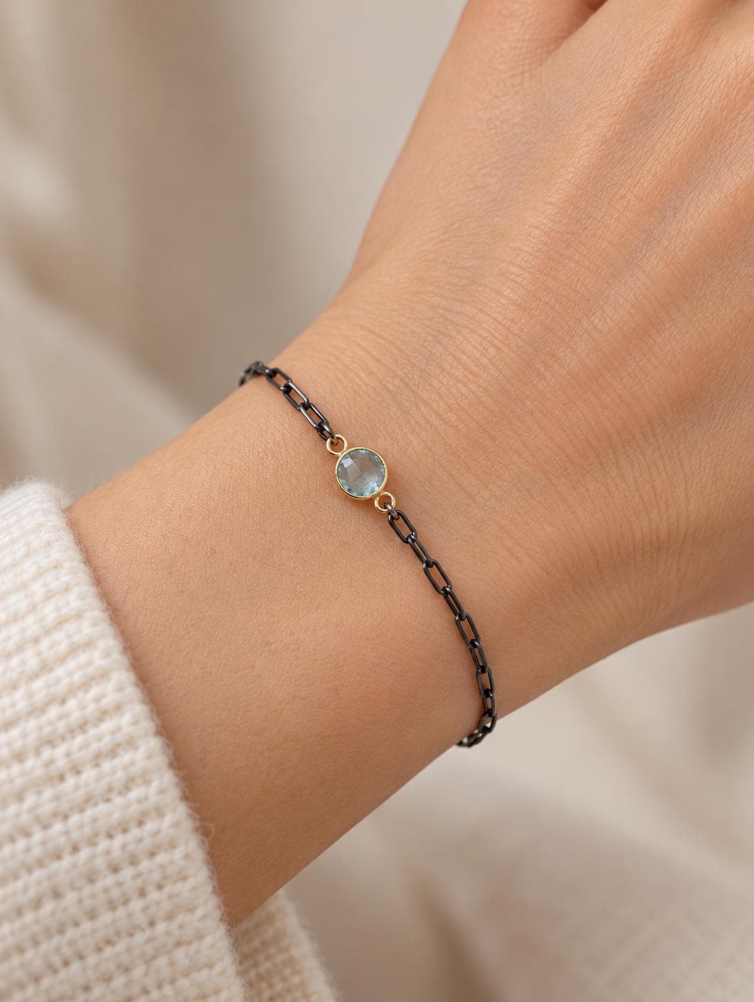 Blue Topaz Bracelet in Oxidized Sterling Silver Paperclip chain with a Gold Vermeil Bezel : December Birthstone, worn view