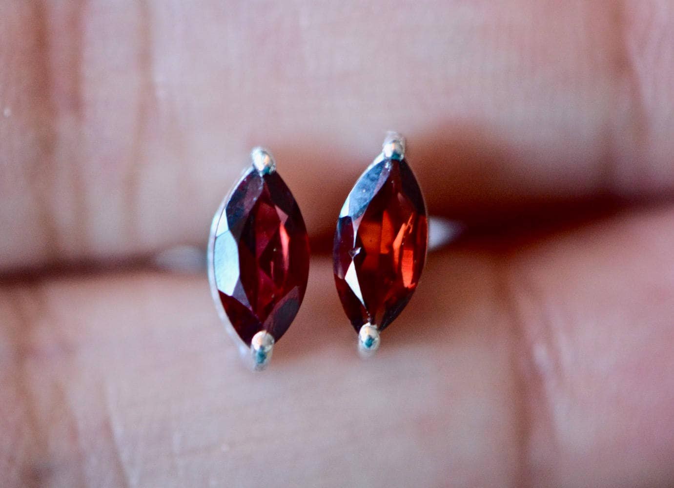 Garnet Marquise Stud Earrings Sterling Silver, January Birthstone, worn view