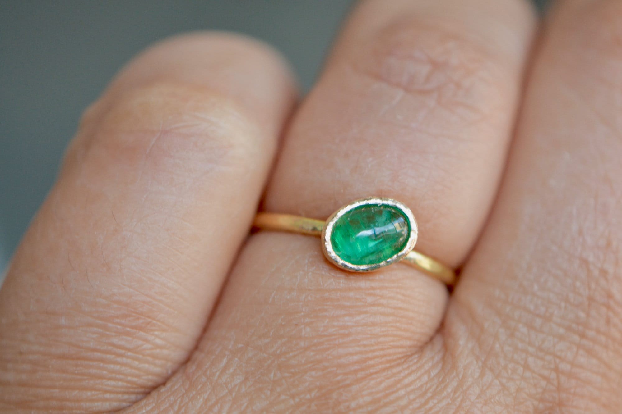 Whimsical Oval Emerald Cabochon Ring 14k Gold, May Birthstone, worn view