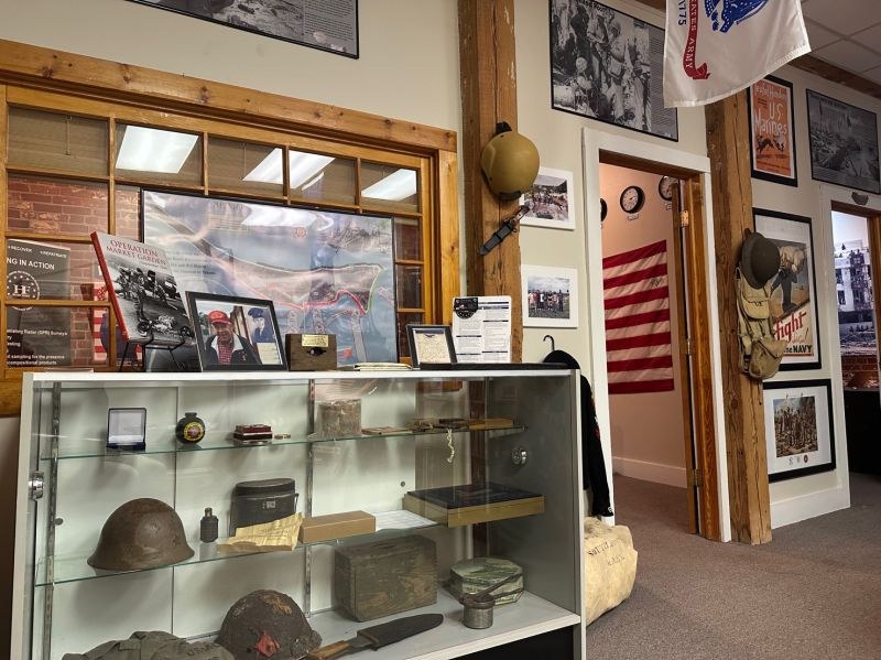 Display case of military artifacts inside History Flight headquarters