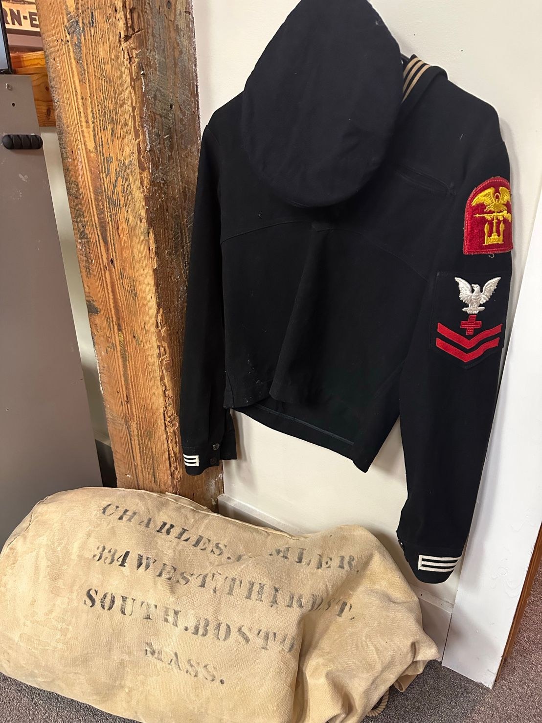 Historic Navy uniform displayed inside History Flight headquarters