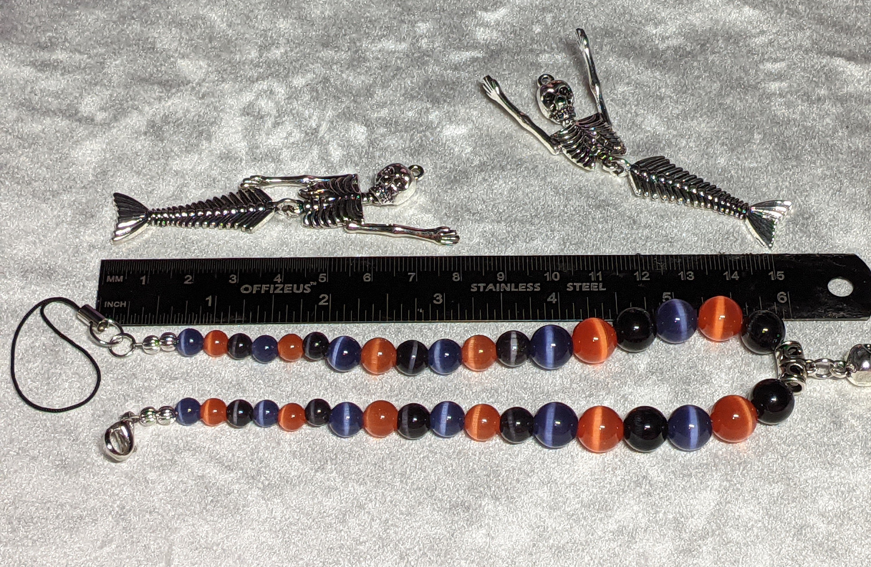 Skeleton Mermaid Cell Phone Strap: Halloween Wristlet with Cat's Eye Beads