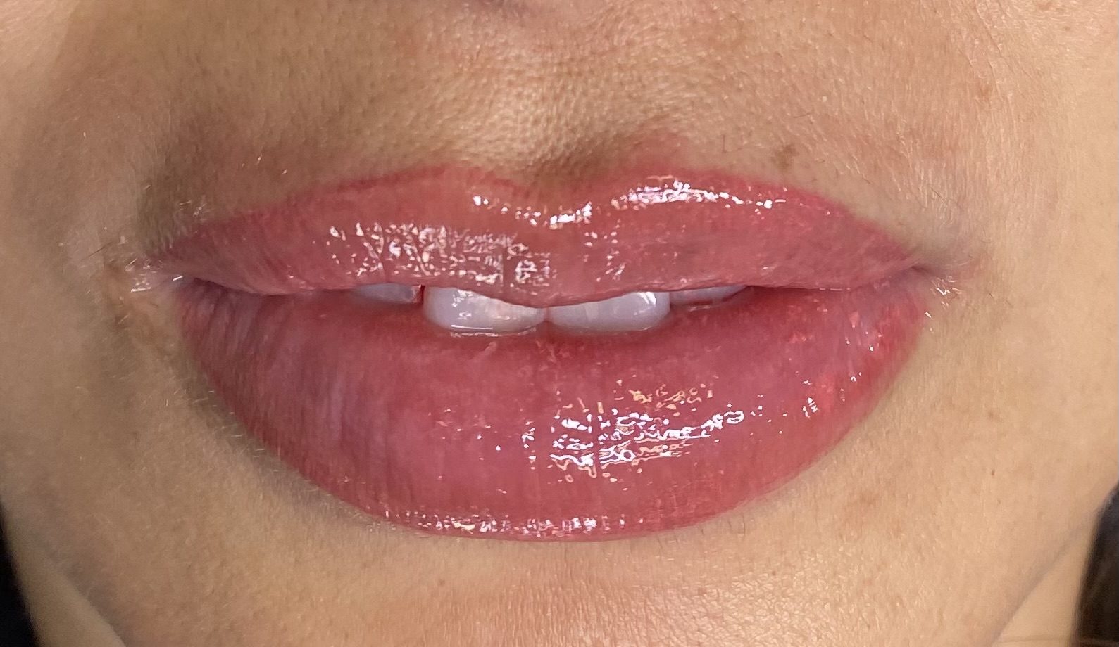 Close-up of pink lip blush results