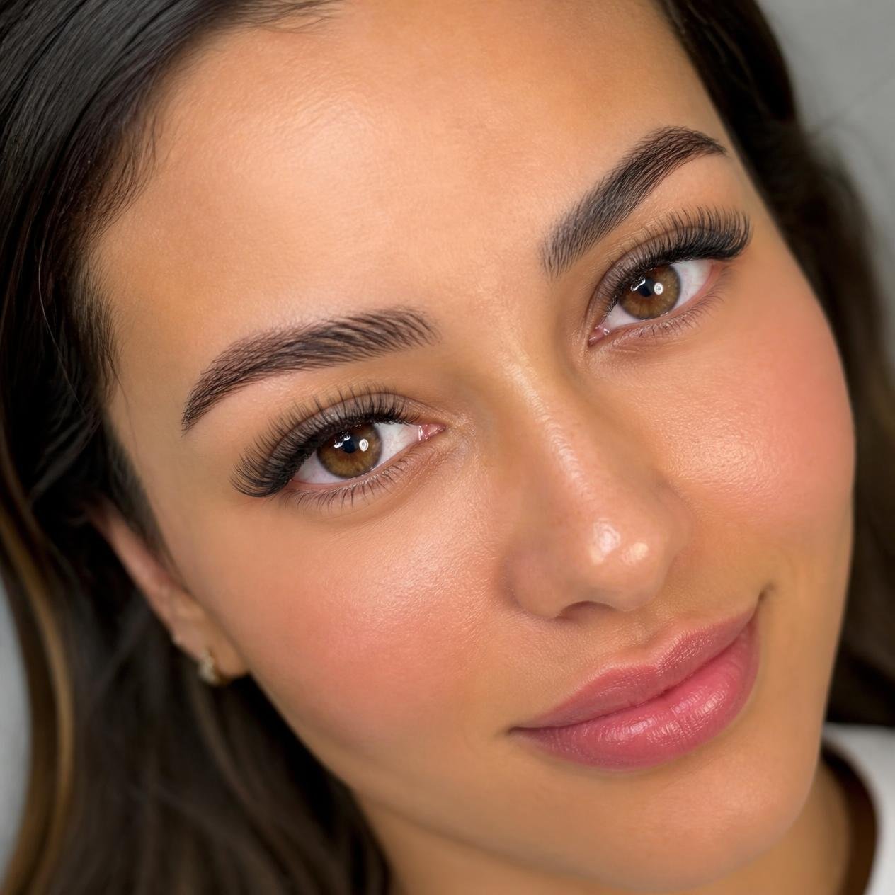 Close-up portrait with soft, full lash extensions
