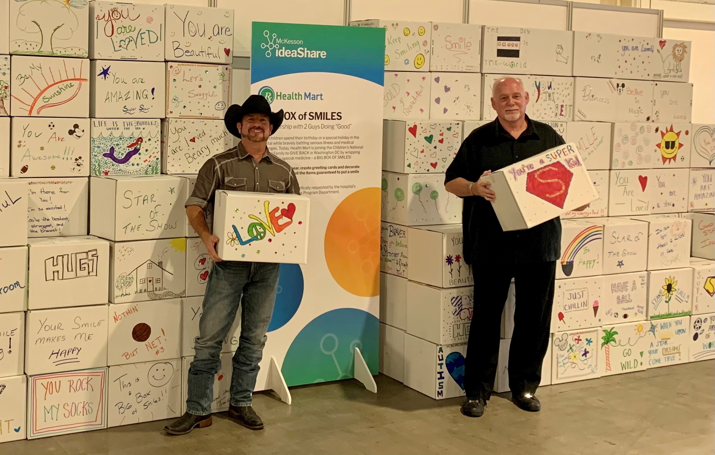 Steven Foster and Rowan Pickering with Big Box of Smiles donations