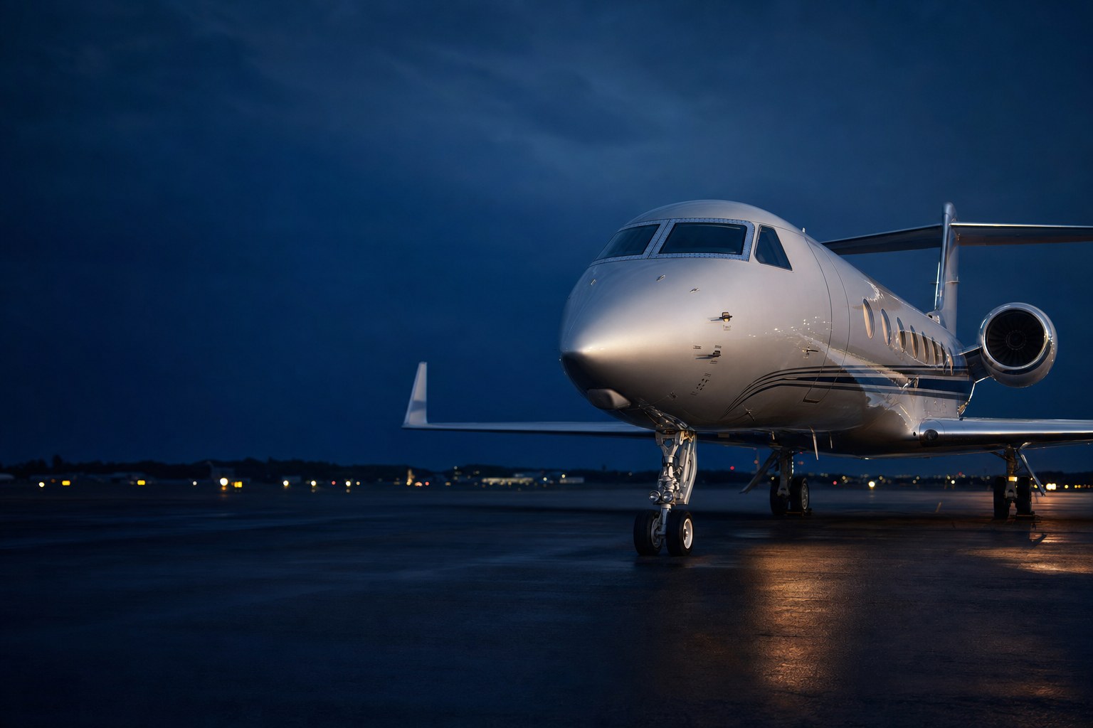Private jet on a runway at dusk