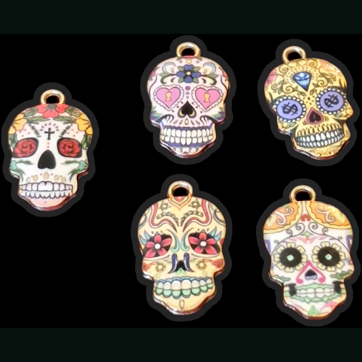 Five colorful Day of the Dead sugar skull pendants available for custom jewelry