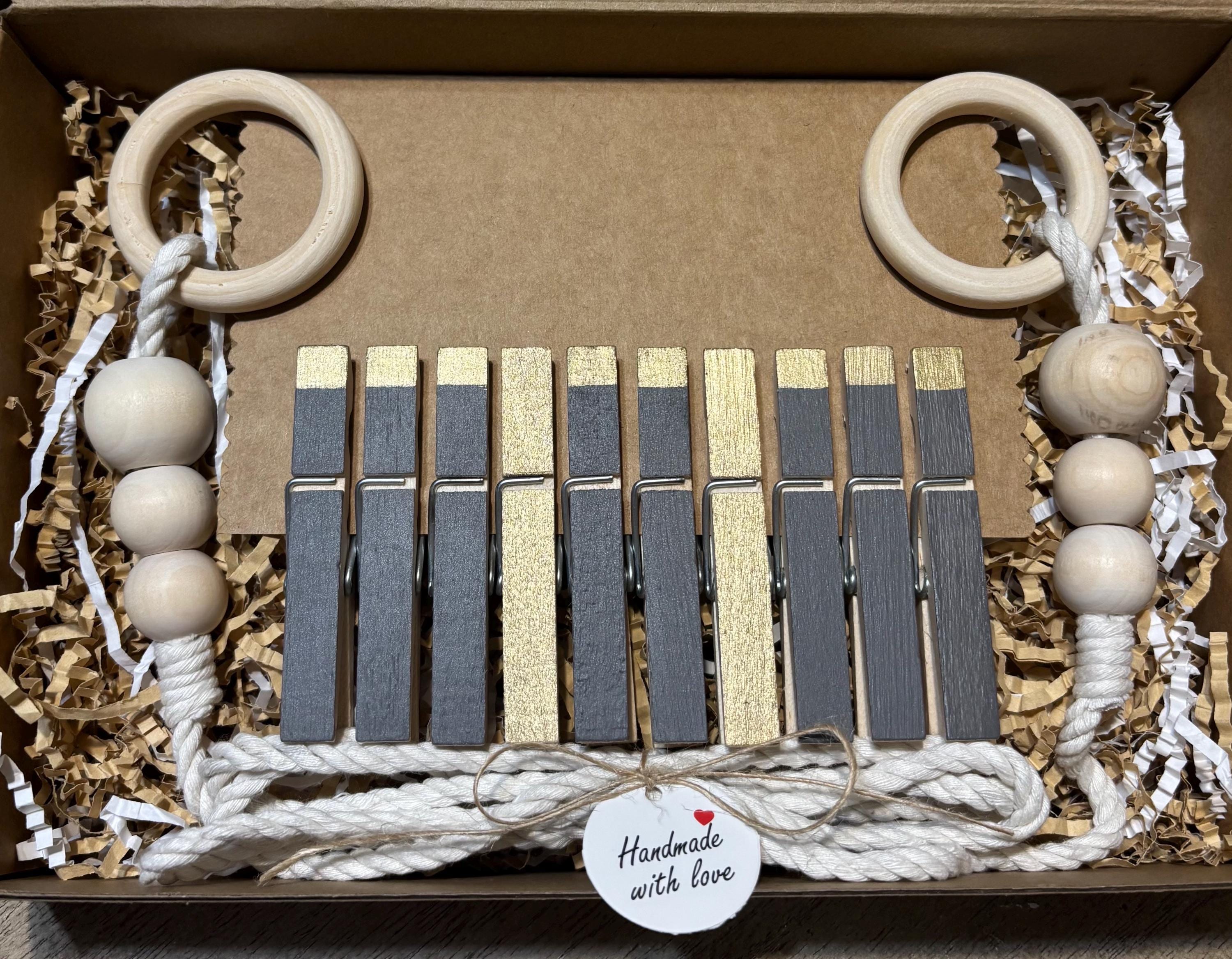 Gray & Gold Clothespin Garland | Kids Artwork Display, Photos, Cards | Handmade Wall Decor displayed with children's artwork