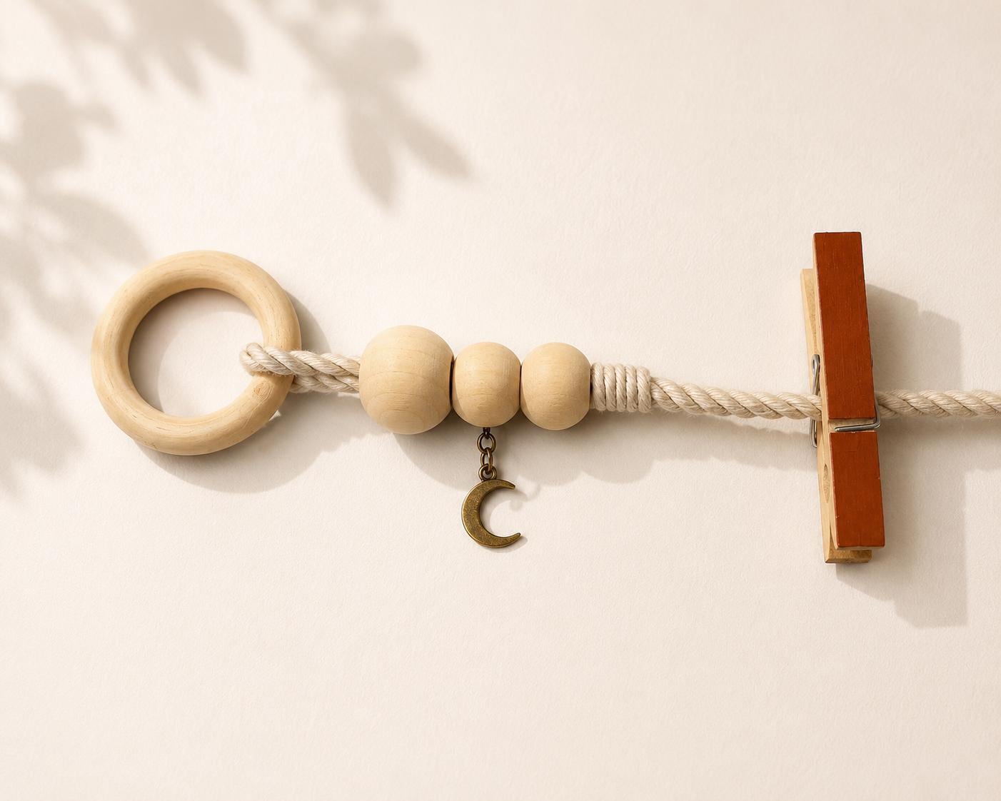 The seasonal moment shown on a handmade children's artwork display garland