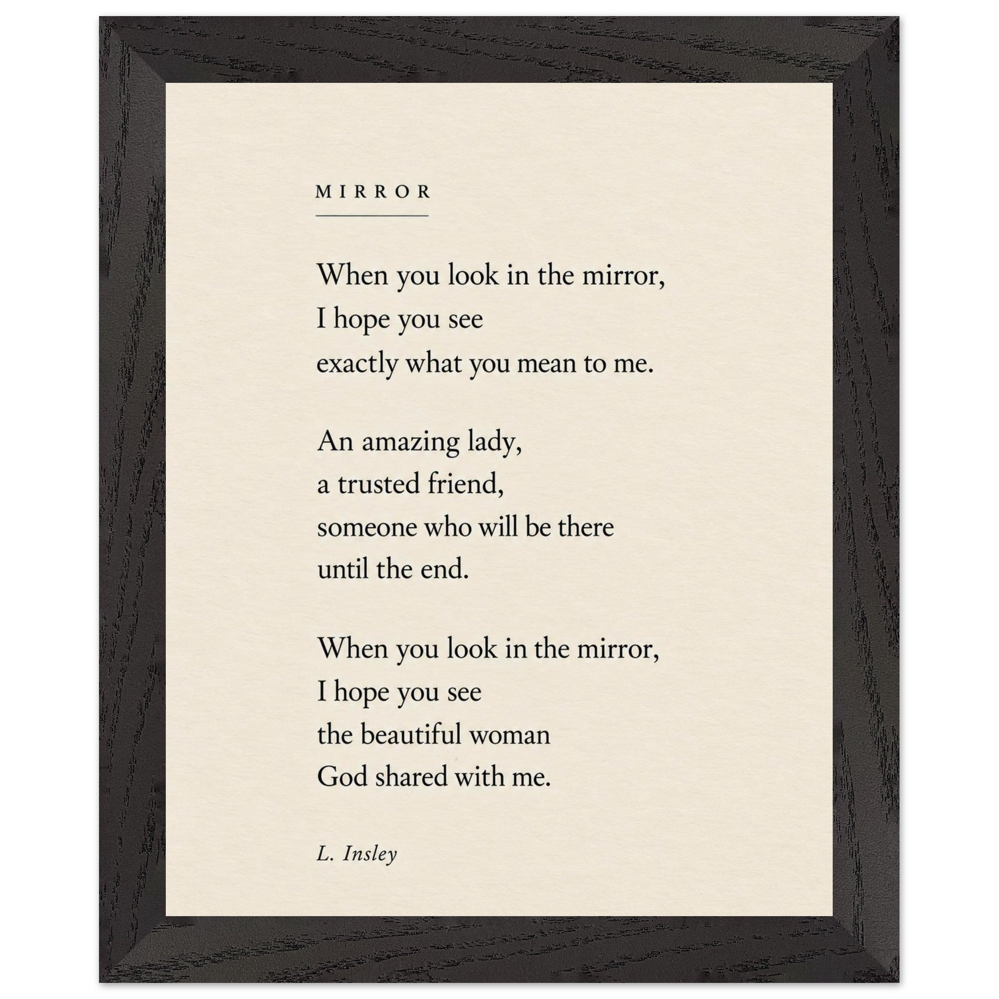 Mirror poem by L. Insley in a black wood frame