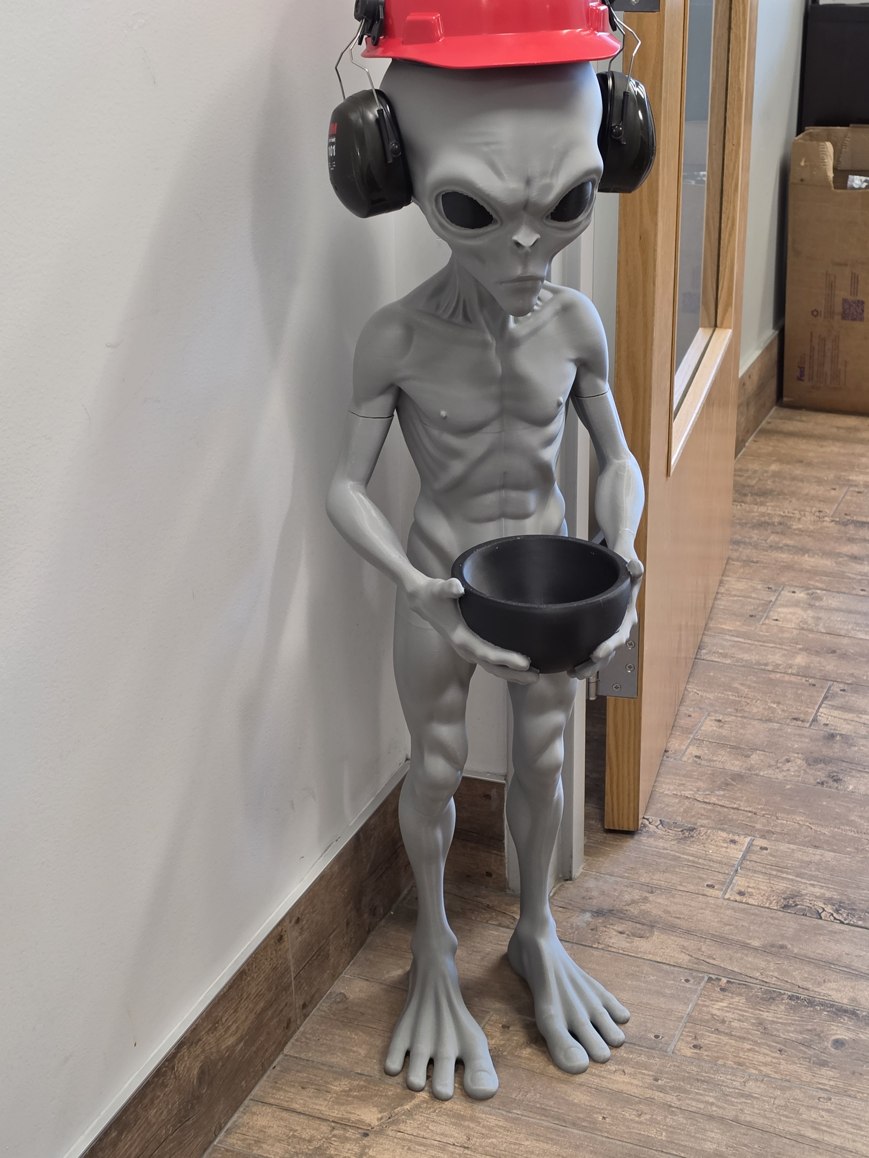 Tall alien candy bowl figure