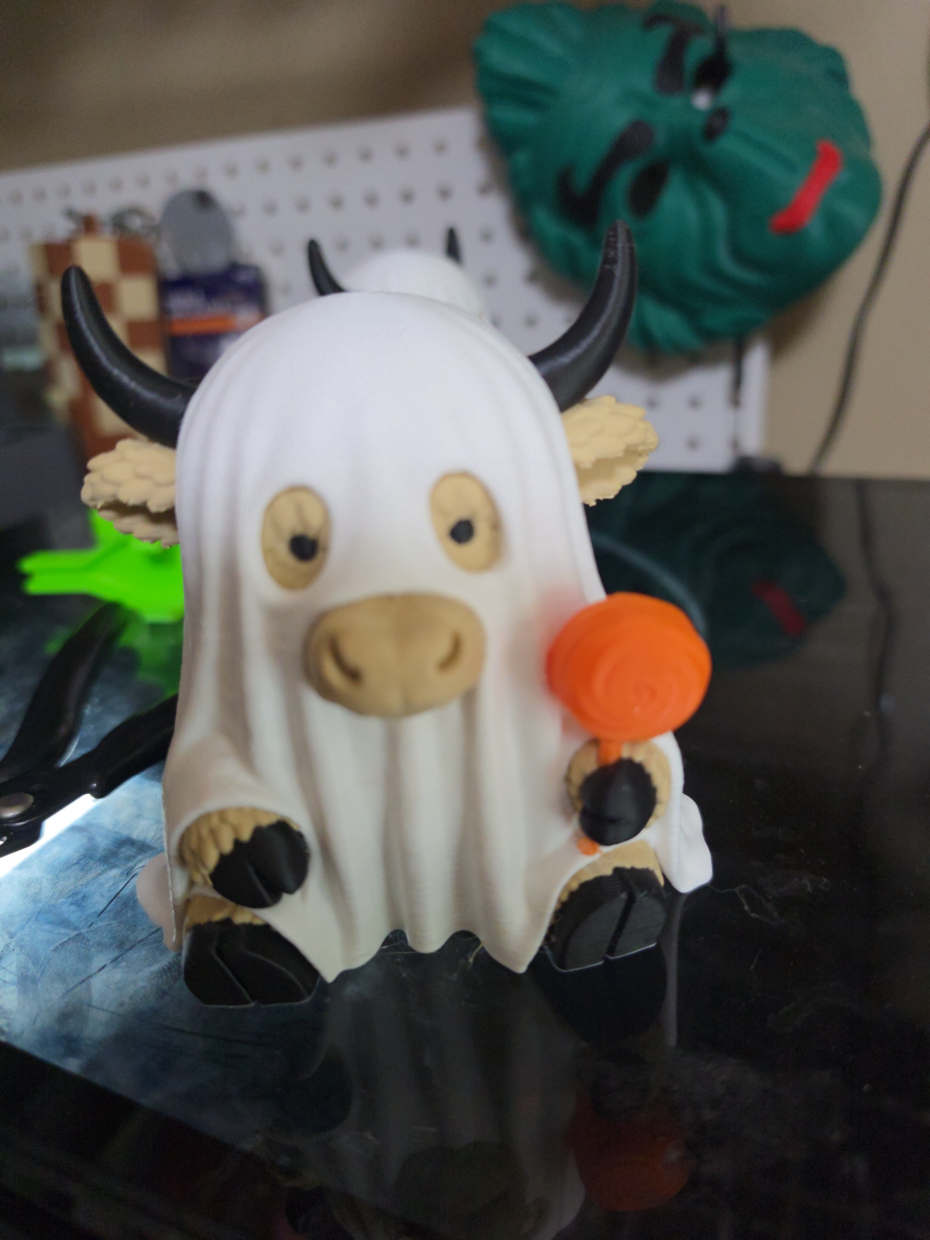 Ghost skull figure with green character accents