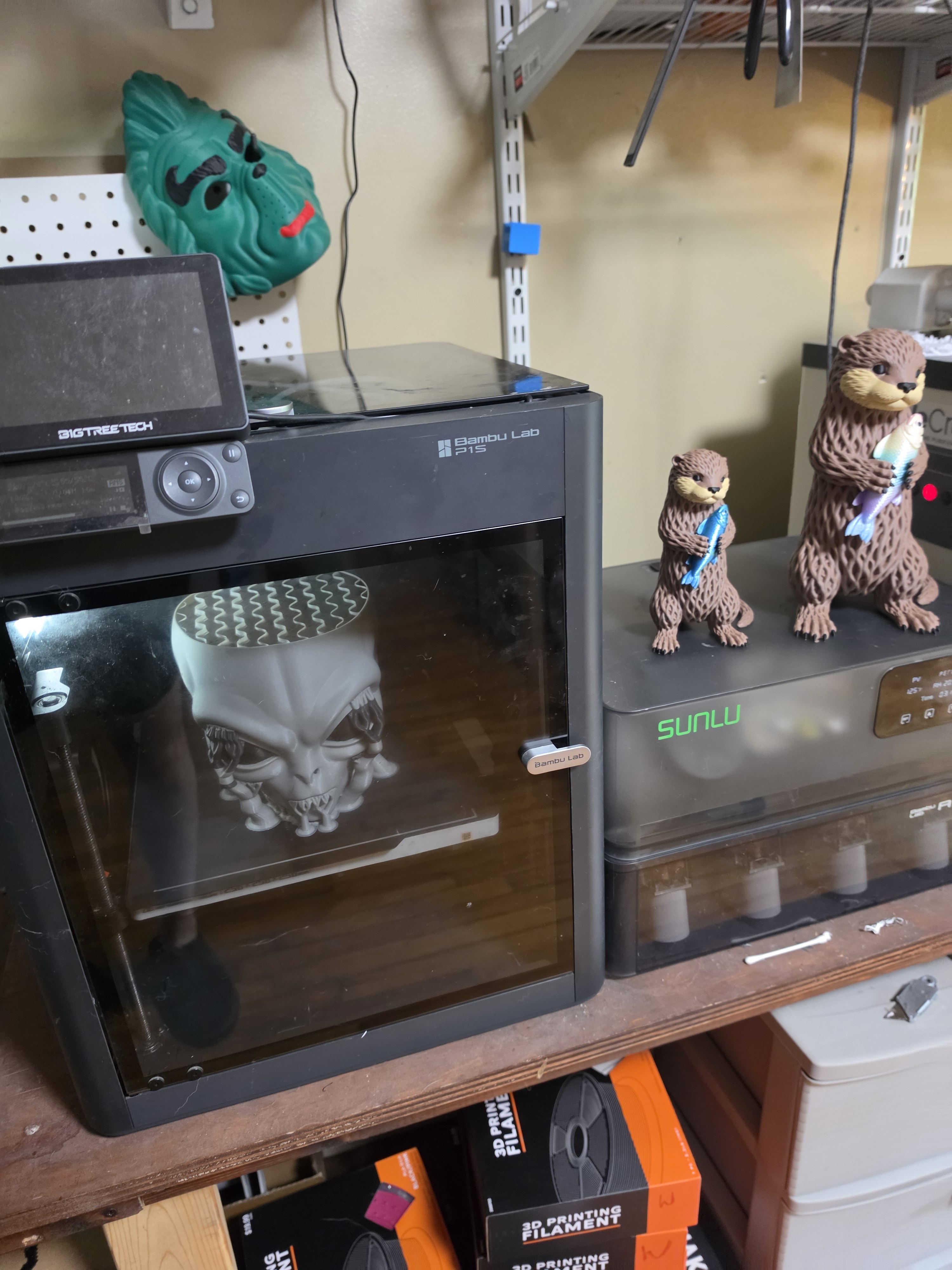 3D printer workspace with finished figures