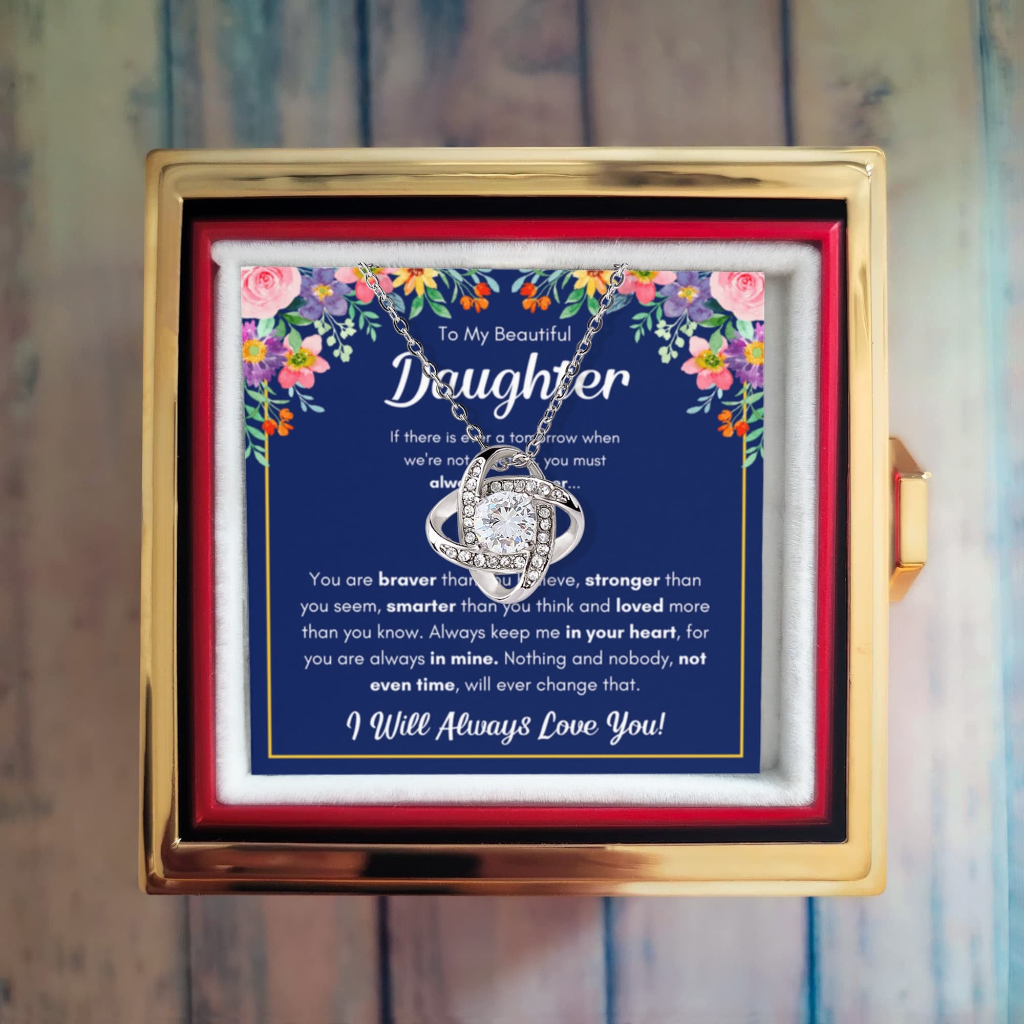 Daughter necklace shown in a rose gift box