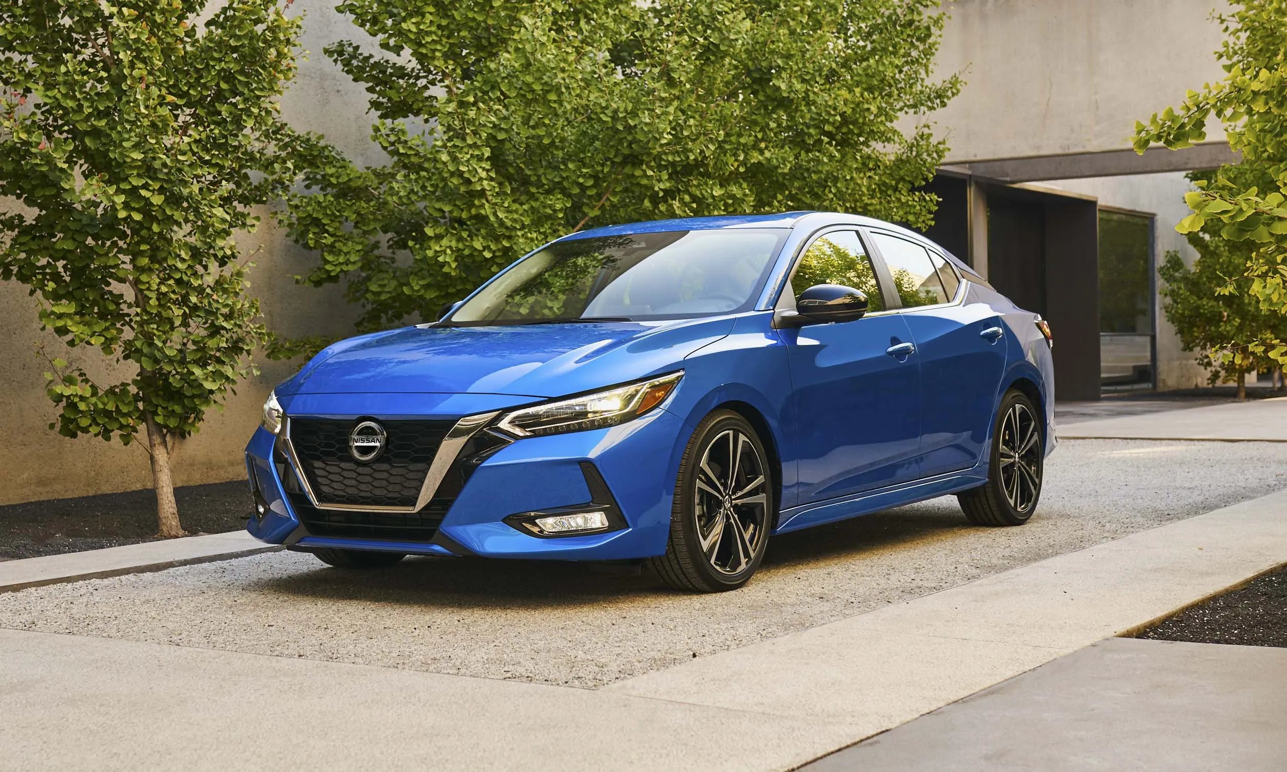 Midsize rental car parked for pickup