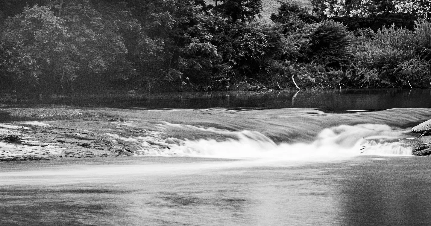 Black and white river landscape photograph