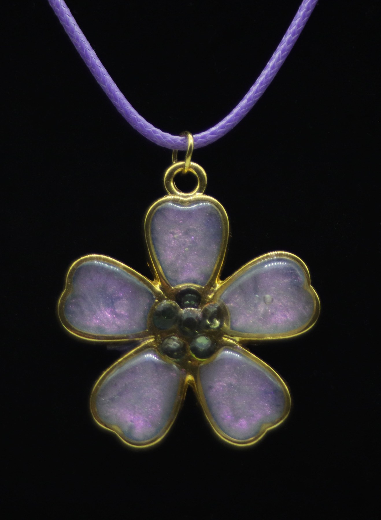 A handmade lavender flower resin necklace for a personal Christmas gift