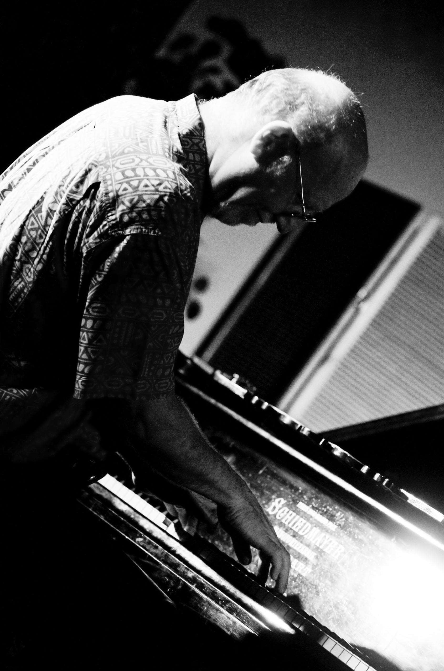 Michael Jefry Stevens performing at a grand piano