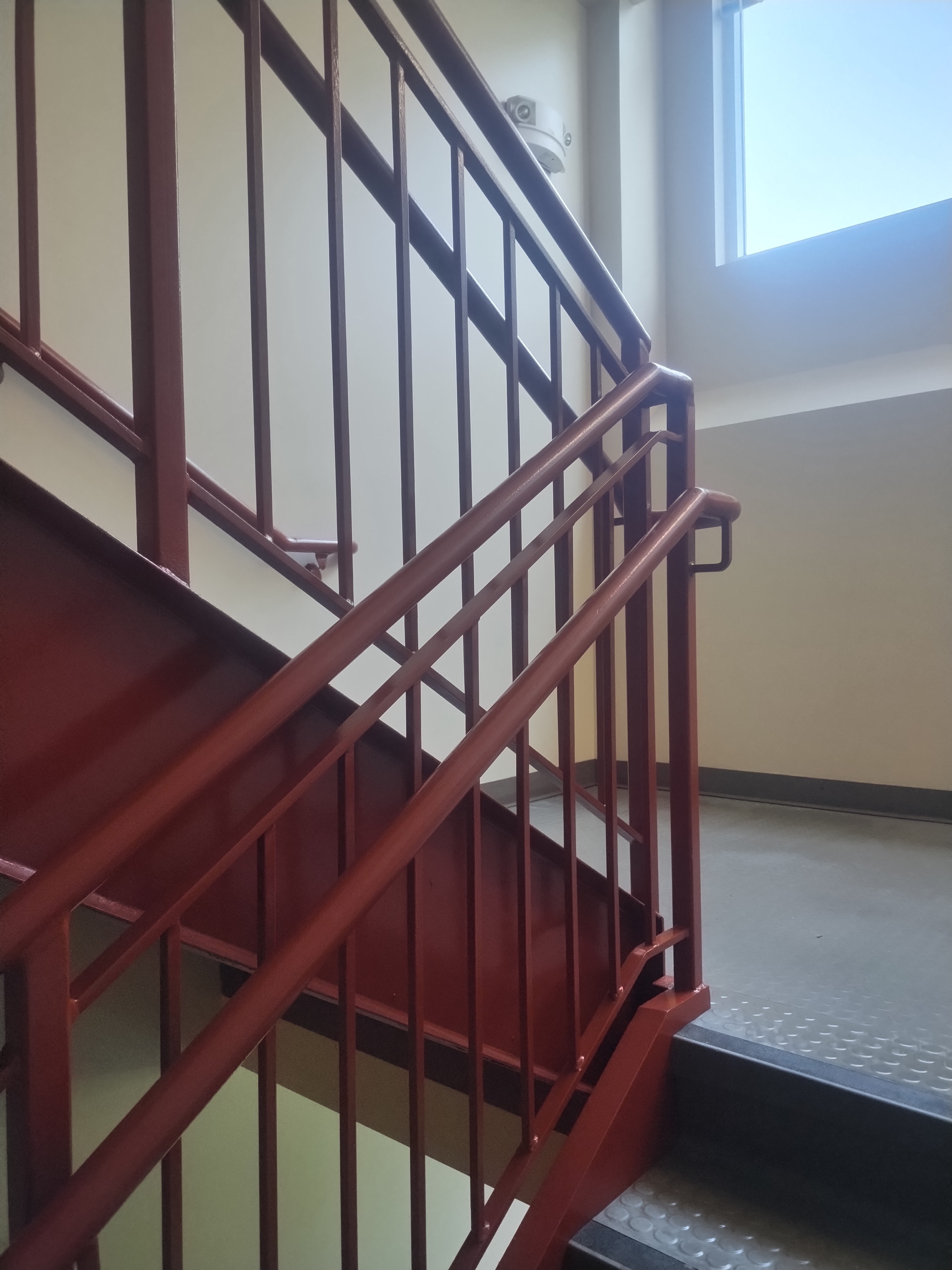 Freshly finished stairway railing detail