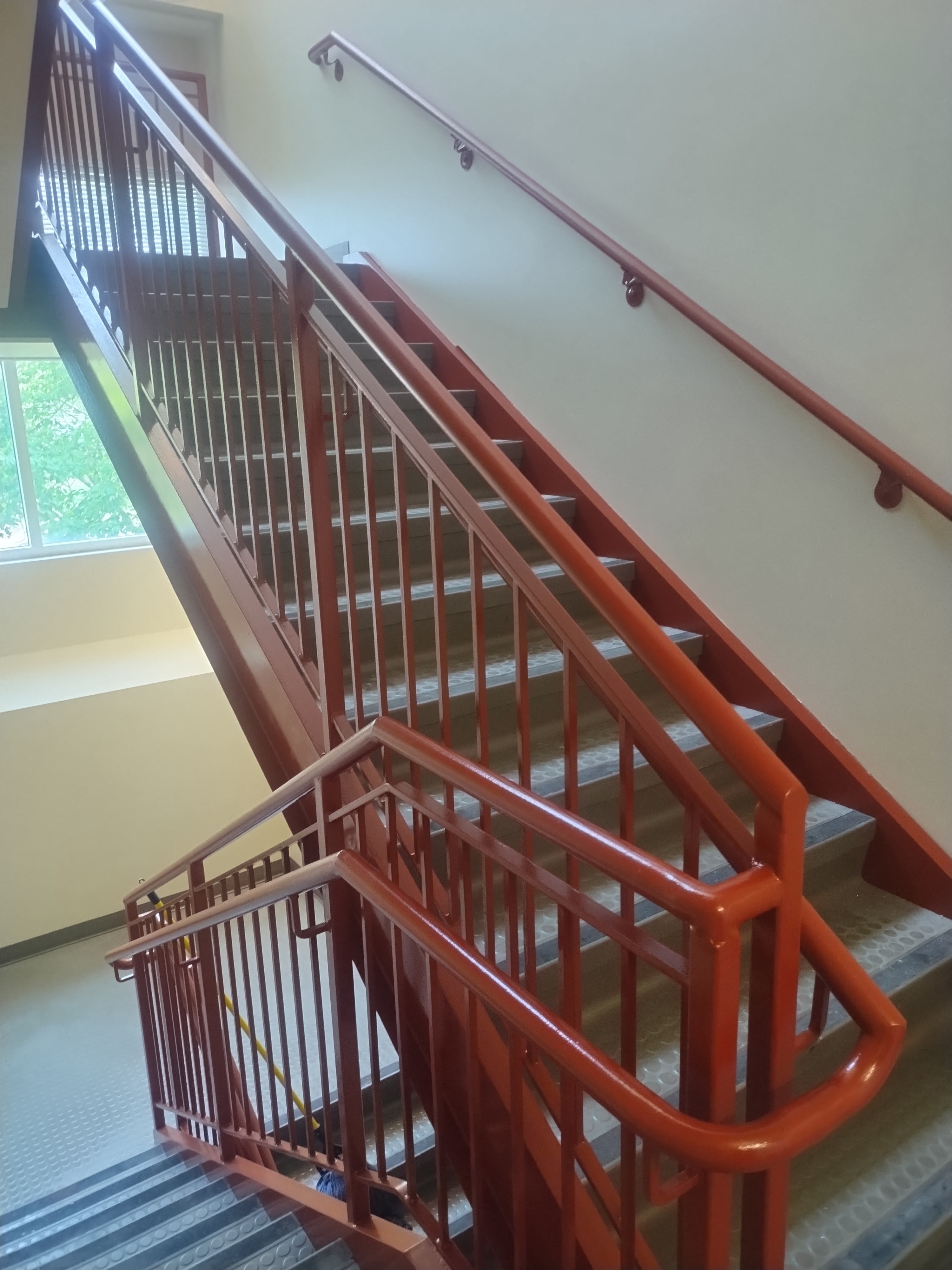Multi-level commercial stairway after repainting