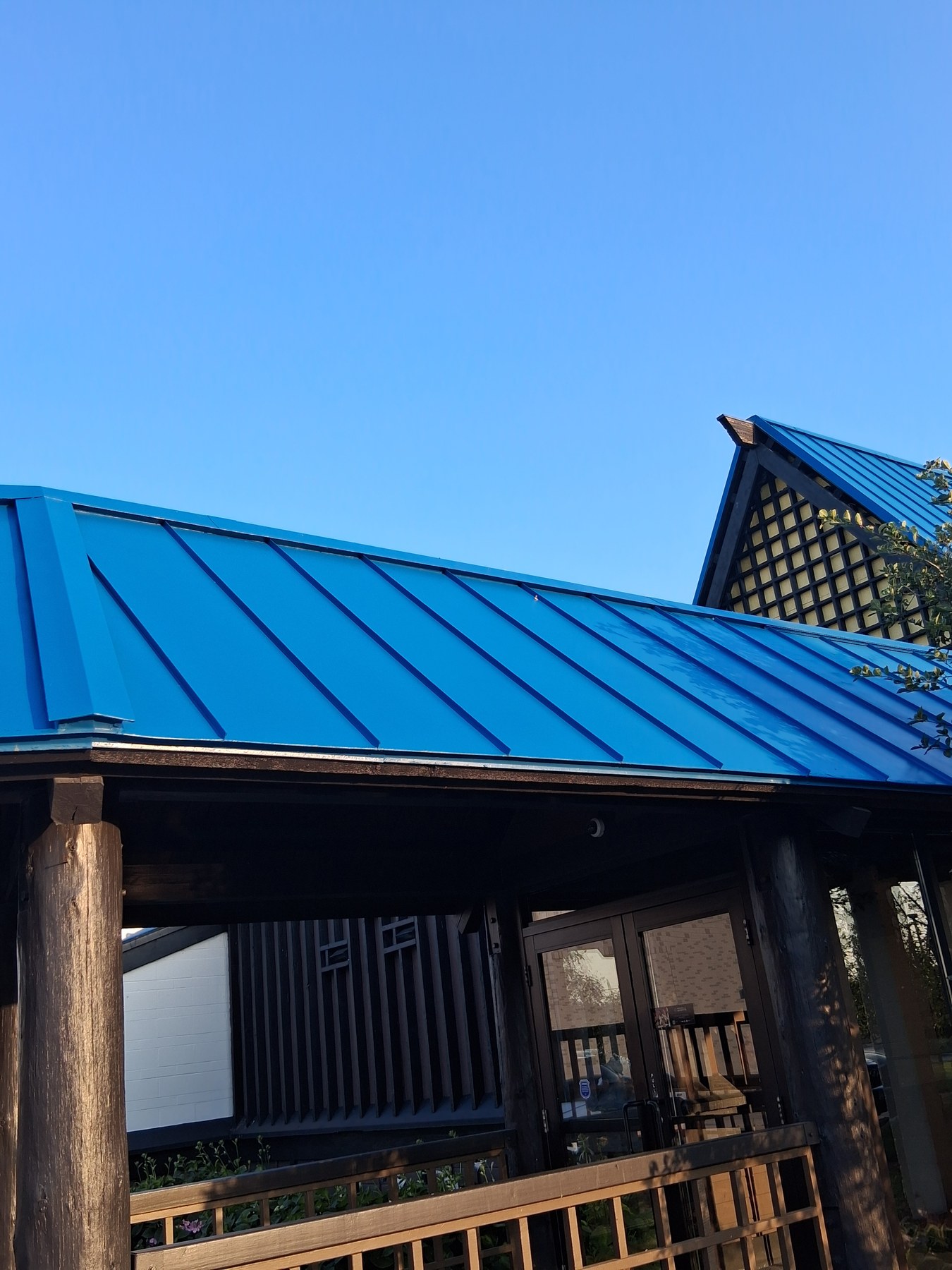 Blue metal roof and distinctive gable detail