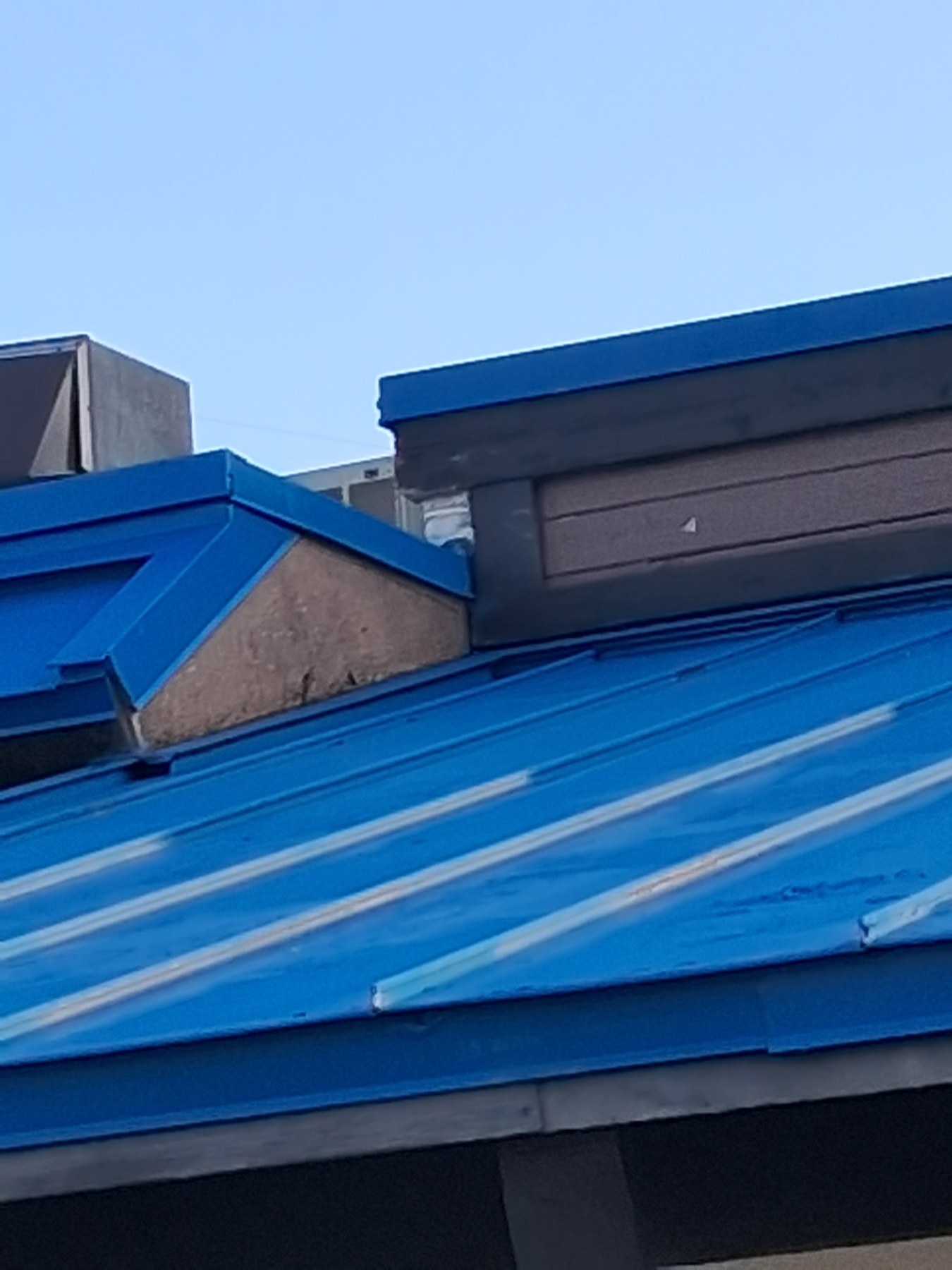Detailed commercial metal roof edge and trim