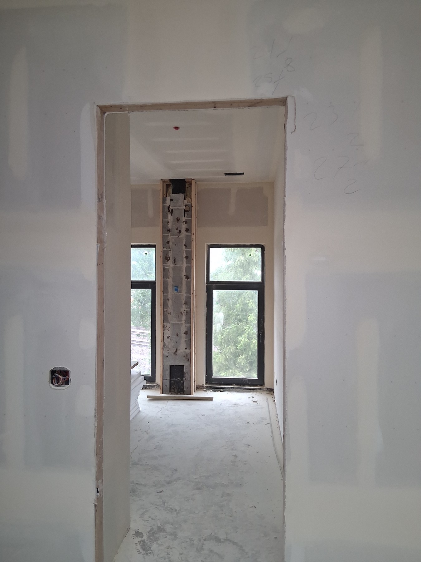 Drywall work framing a doorway in a new home