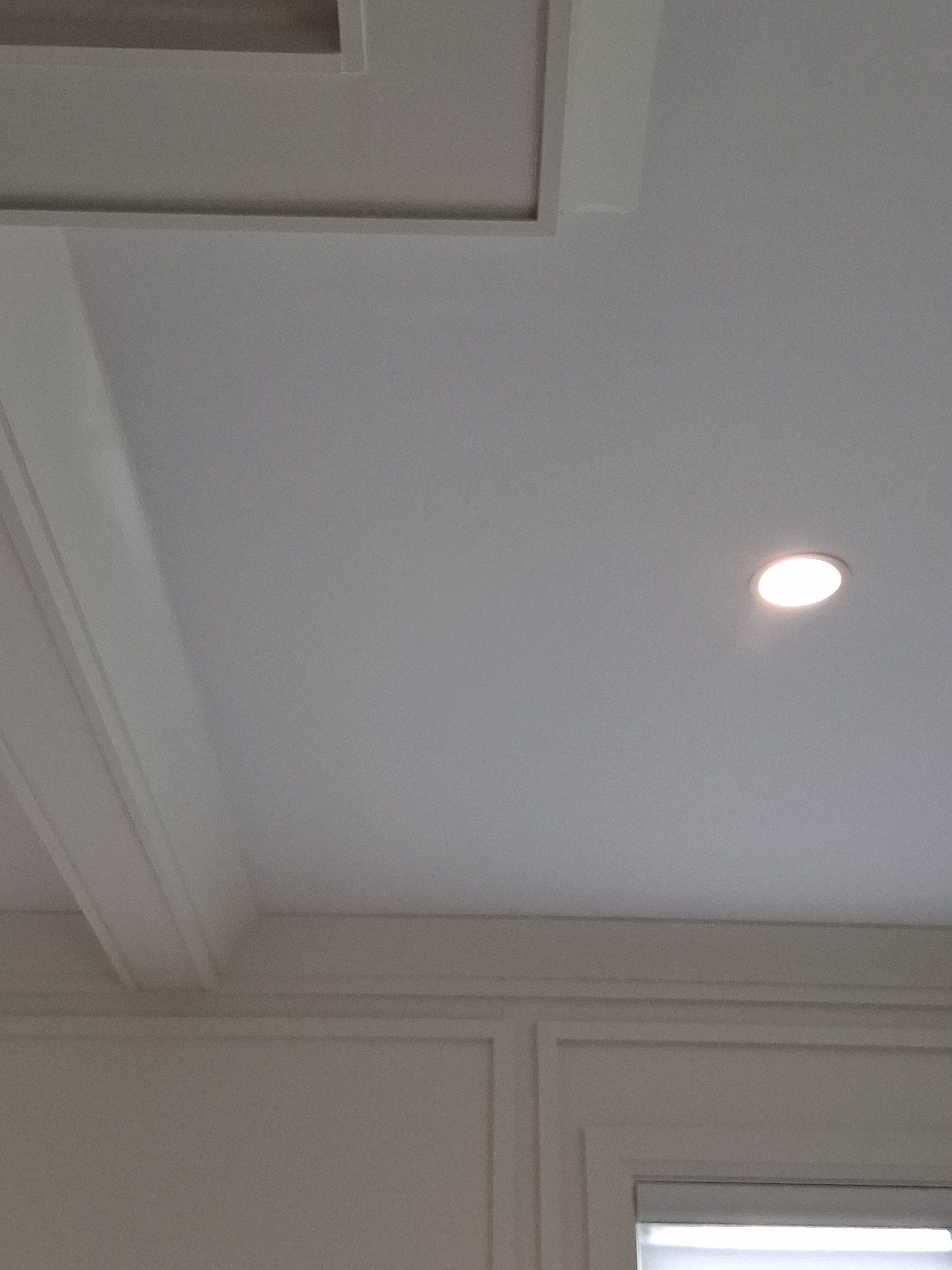 Fresh paint around interior ceiling trim