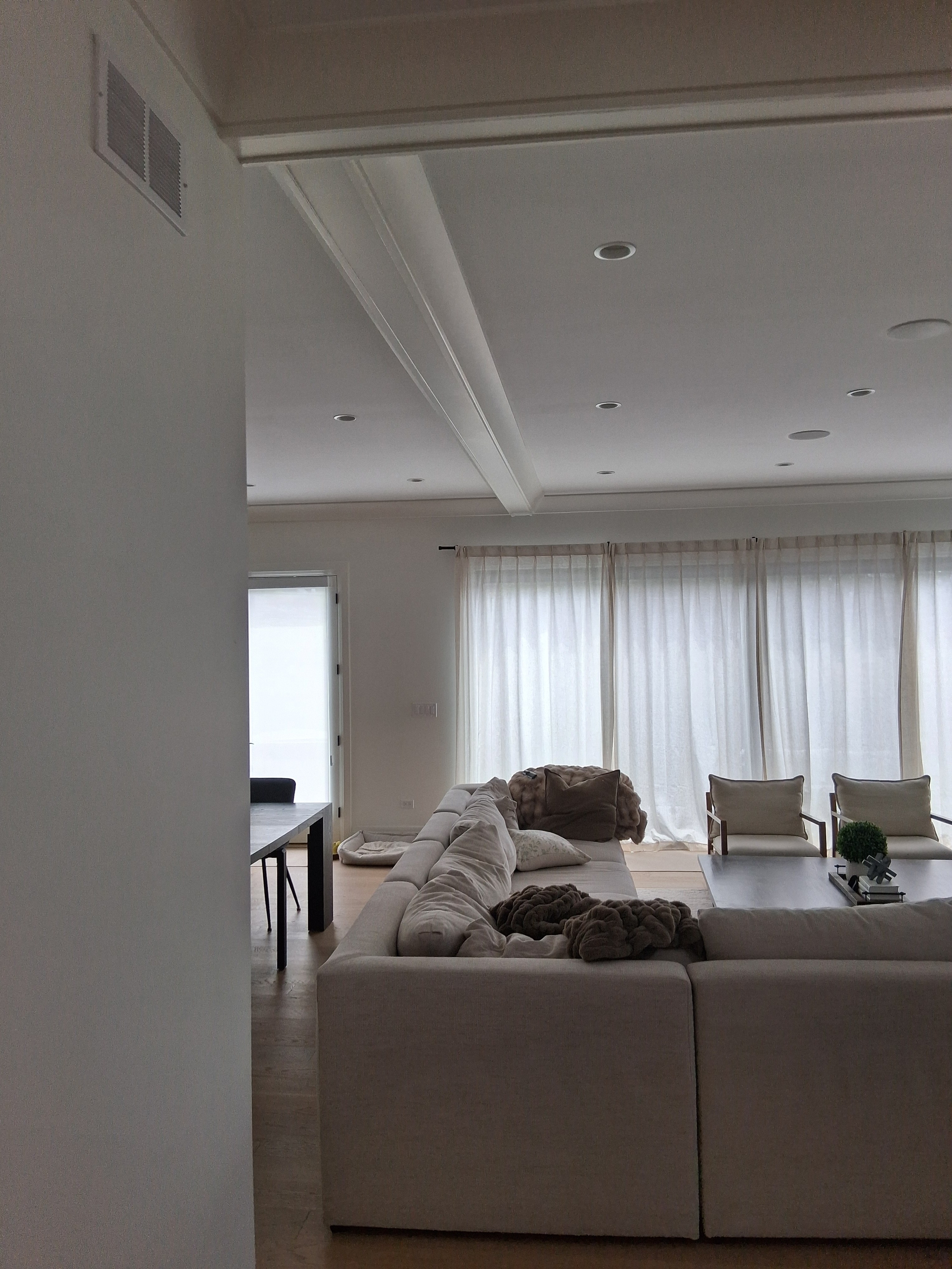 Fresh interior paint across an open dining and living area