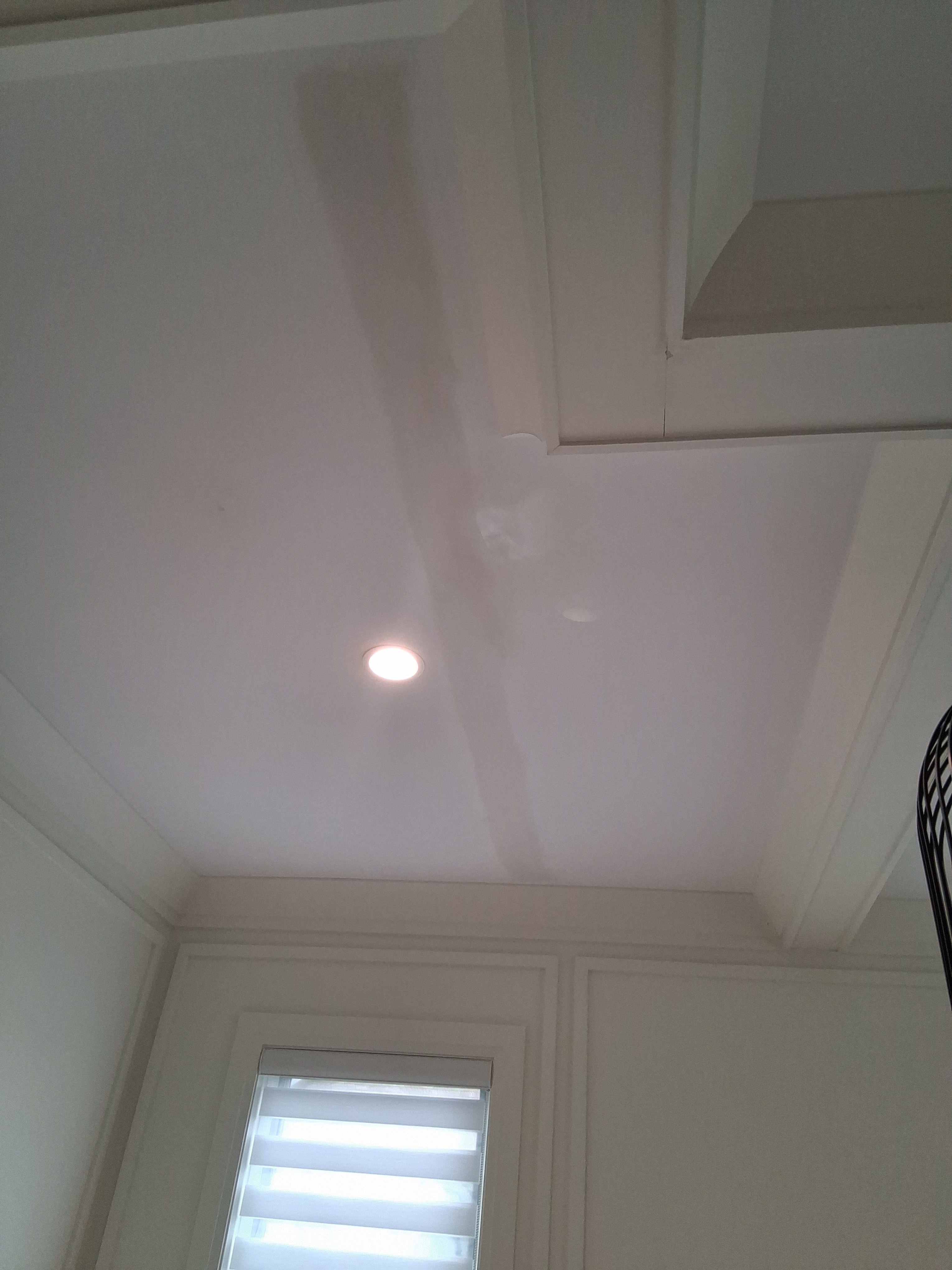 Completed interior staircase with clean white finishes