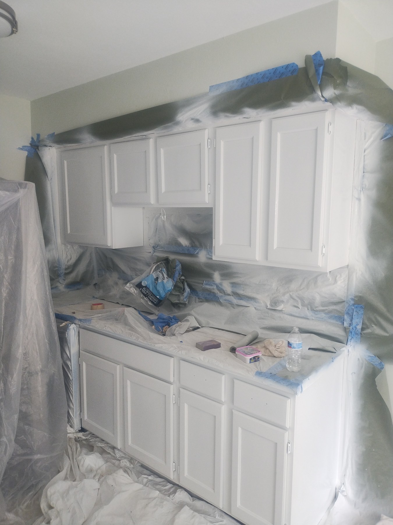 White cabinet finish applied during refinishing