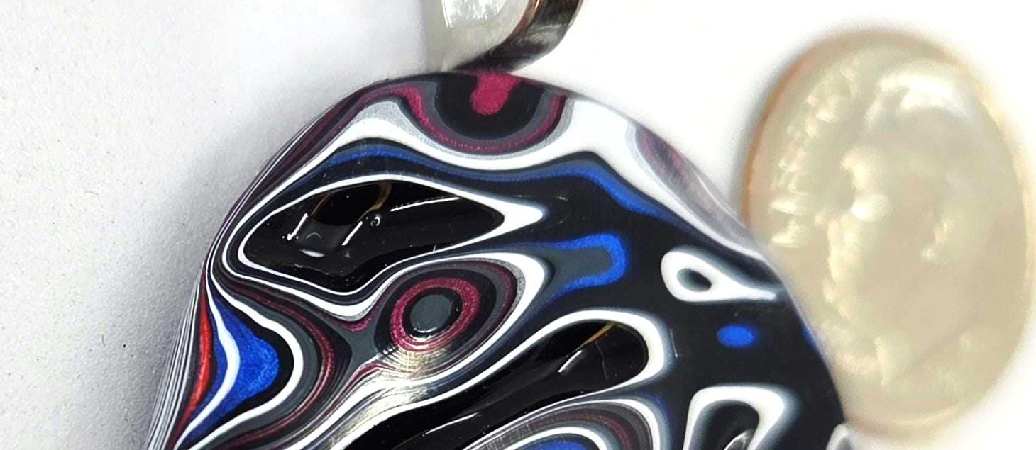 Fordite Pendant / Black Rivers, Islands of Blue, Purple, Red and White, view 4