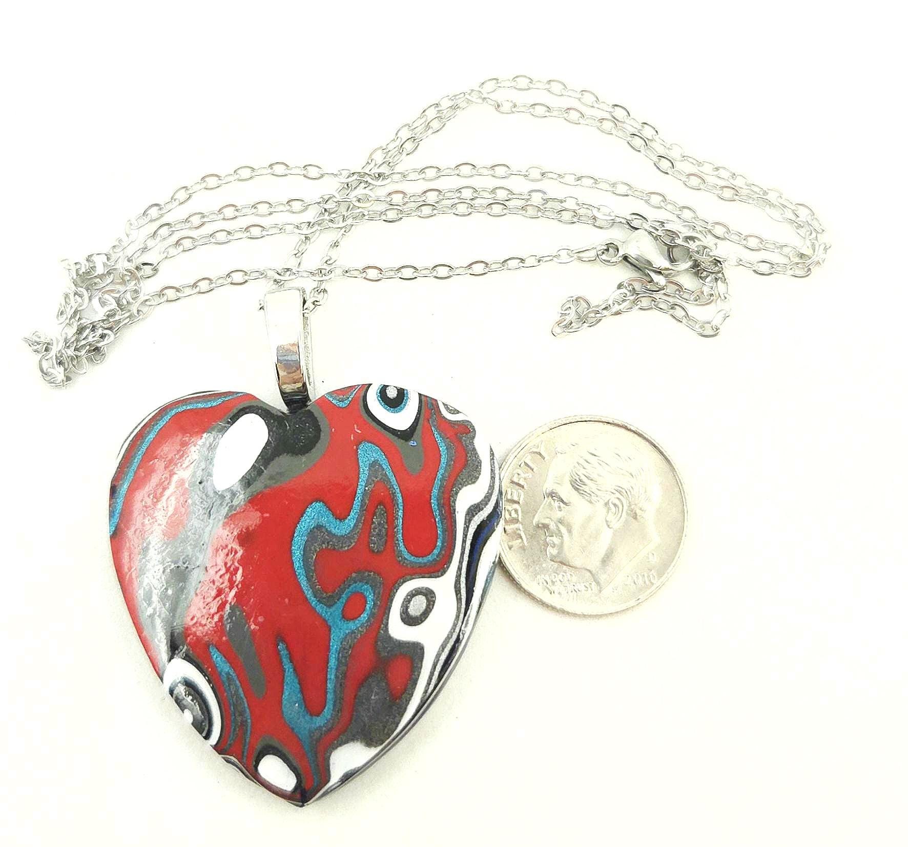 Fordite Heart Shaped Pendant, view 1