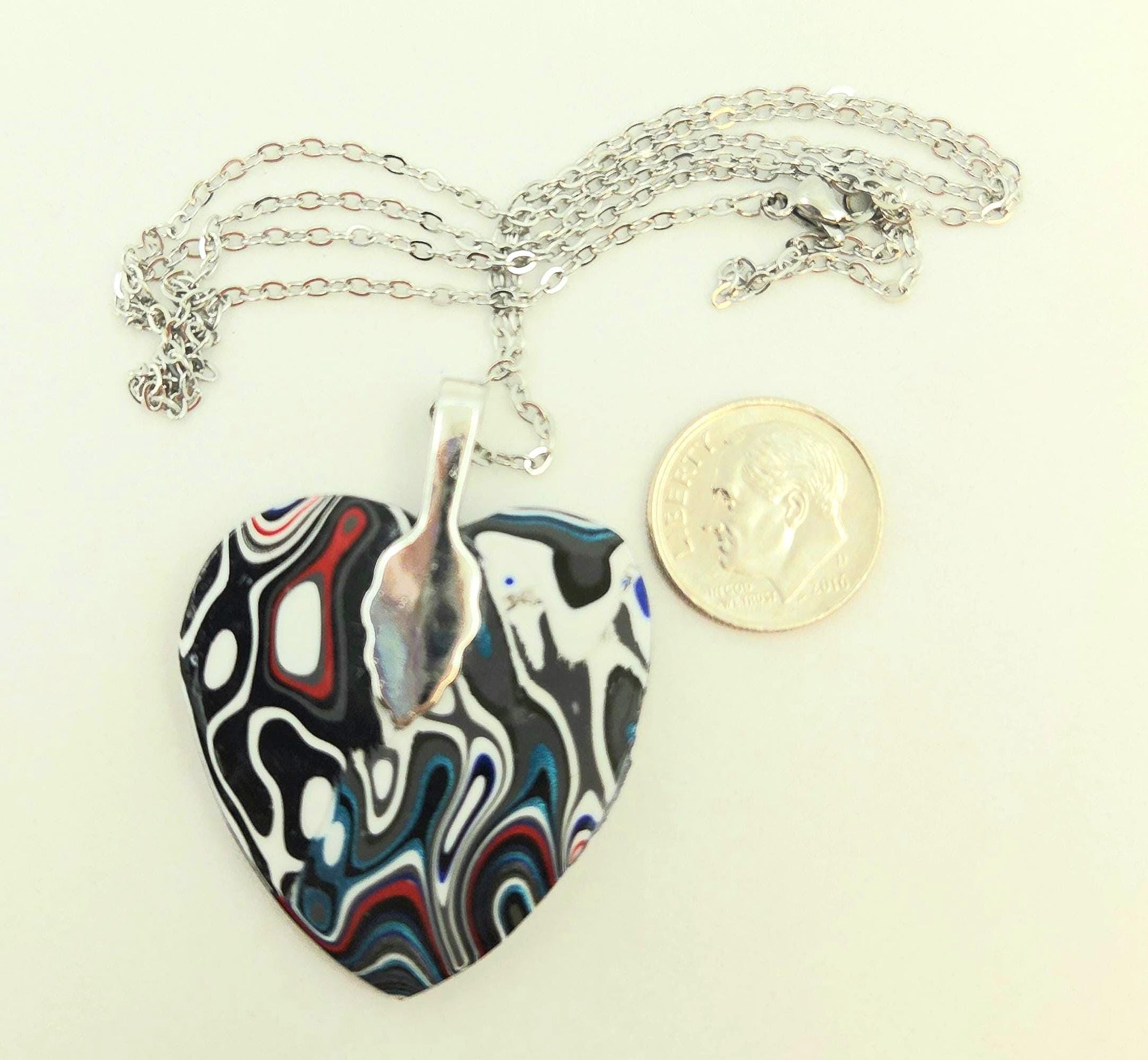 Fordite Heart Shaped Pendant, view 2