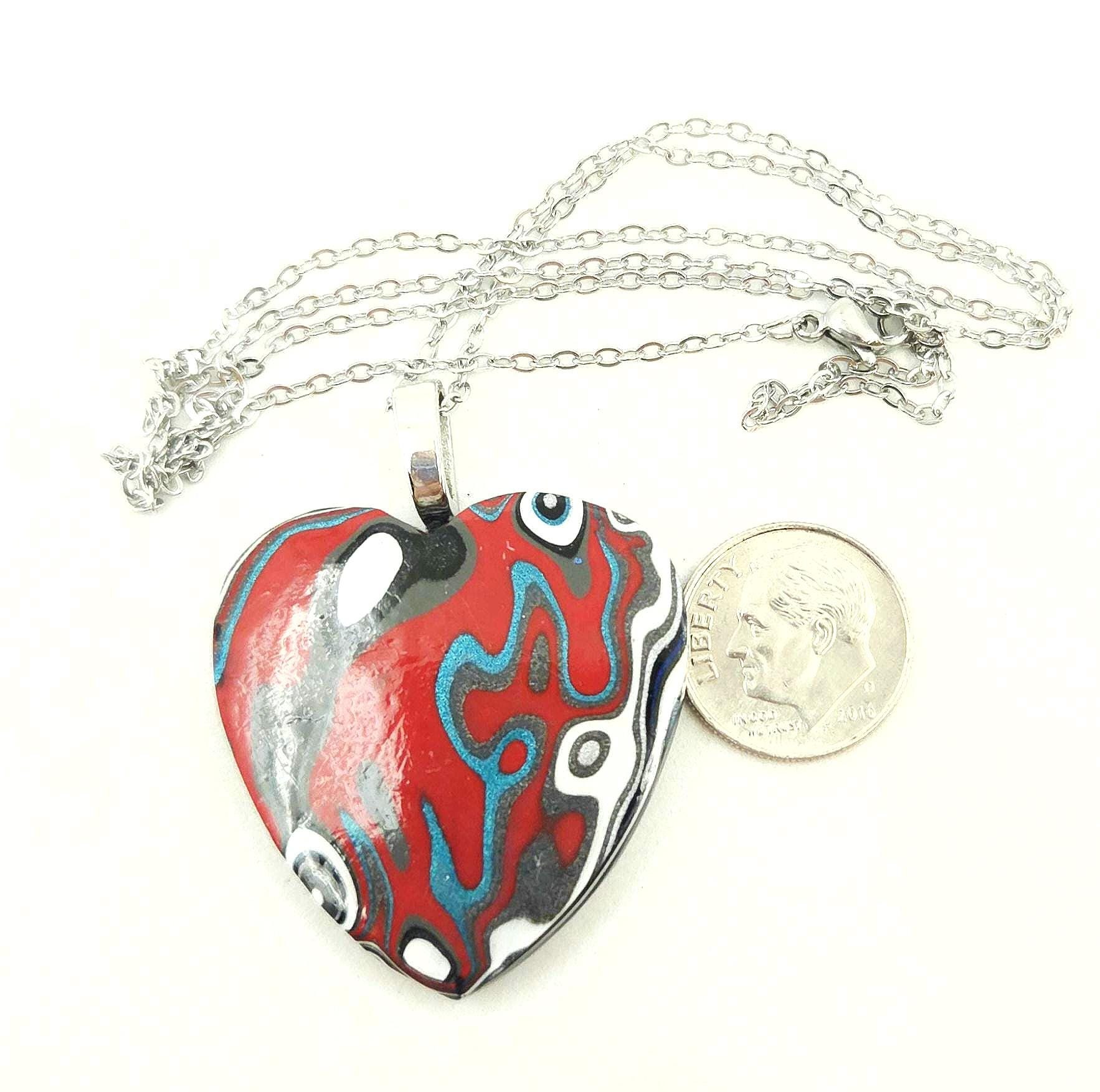Fordite Heart Shaped Pendant, view 3