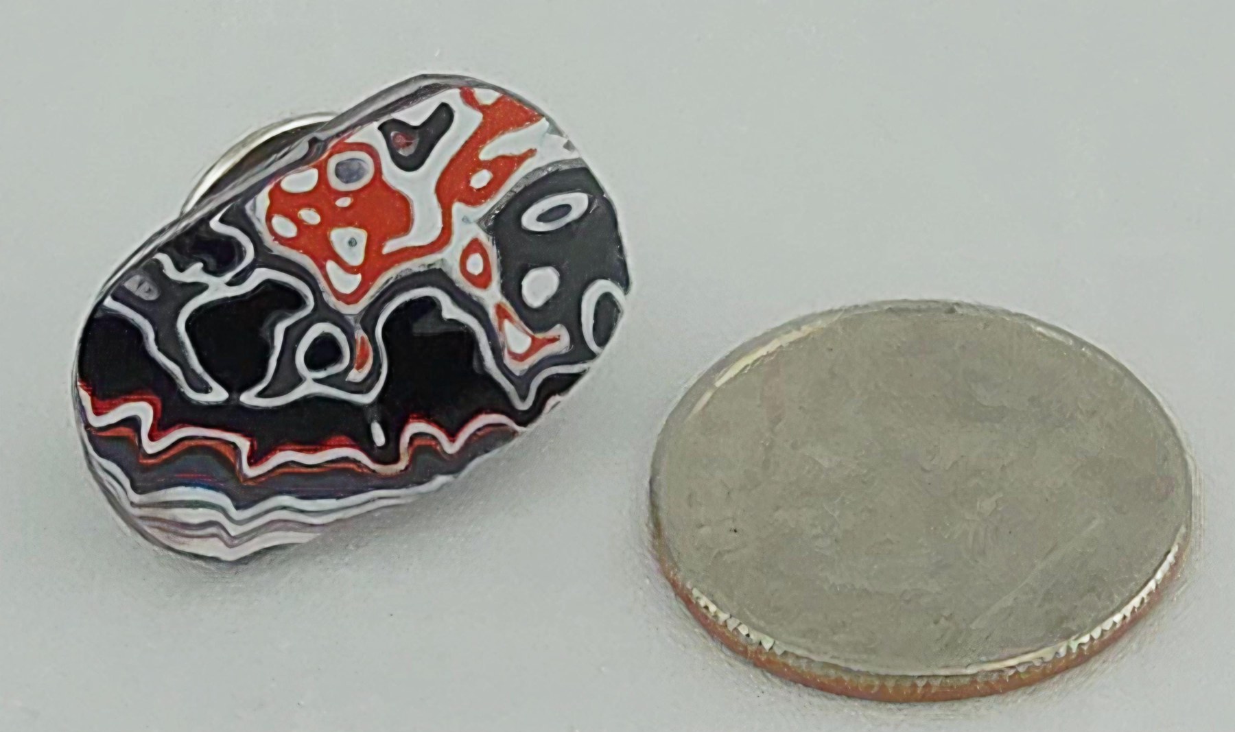 Hand Cut Fordite Tie Tack: Automotive History Lapel Pin for Car Lovers, view 1