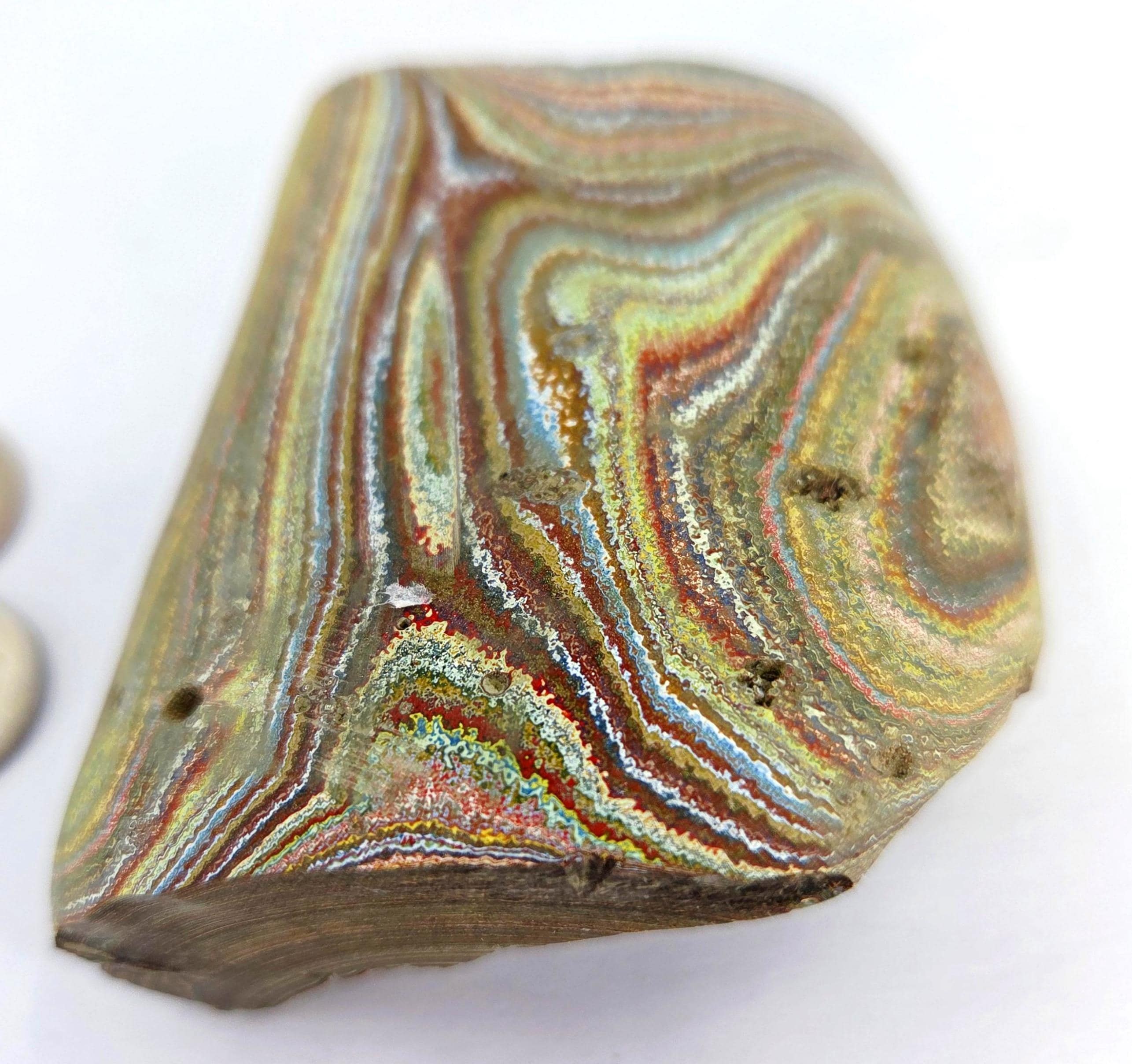 Vintage pastel Fordite rough with a naturally formed layered paint surface