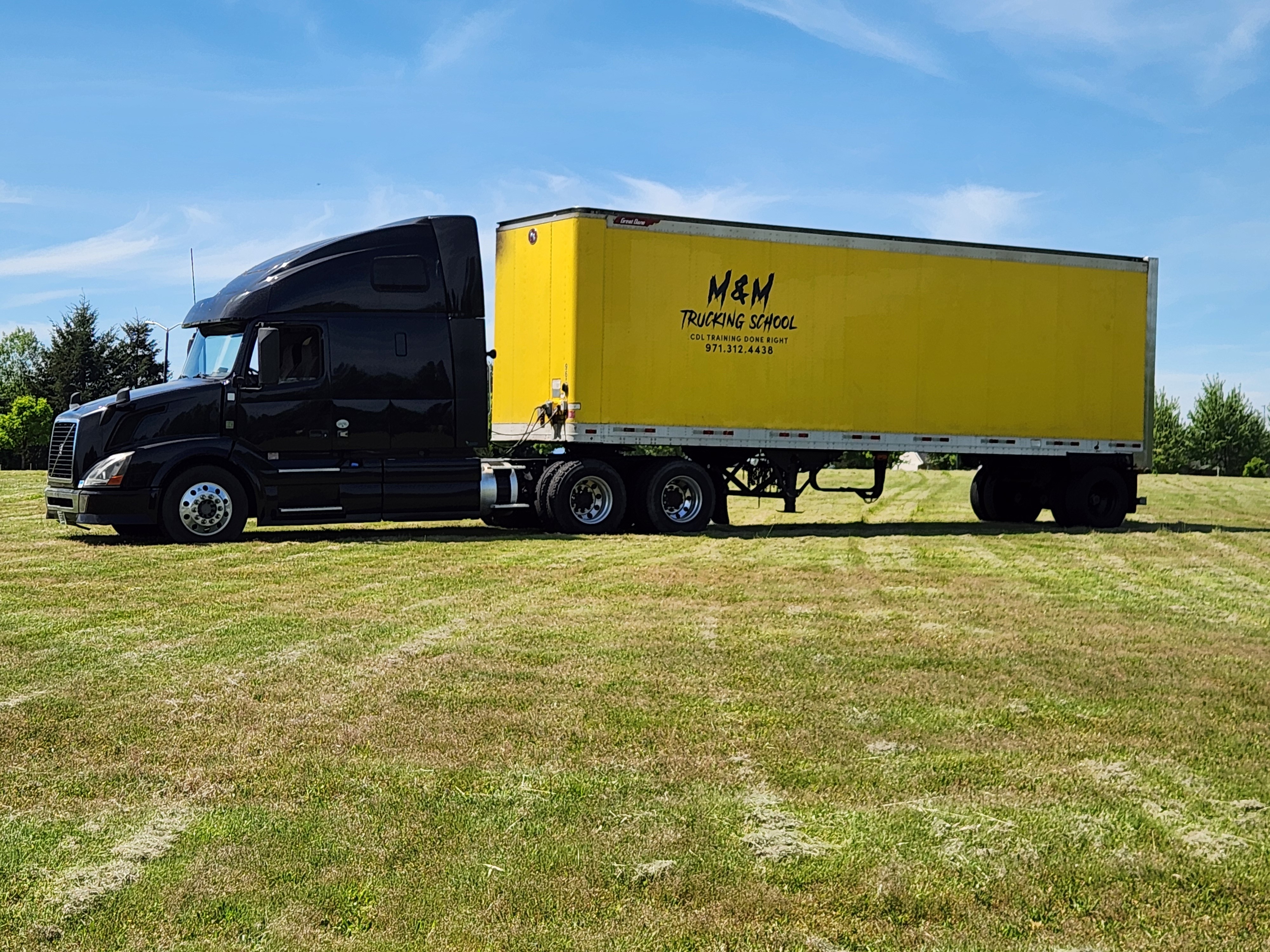 M&M Trucking School training truck at the Ridgefield yard