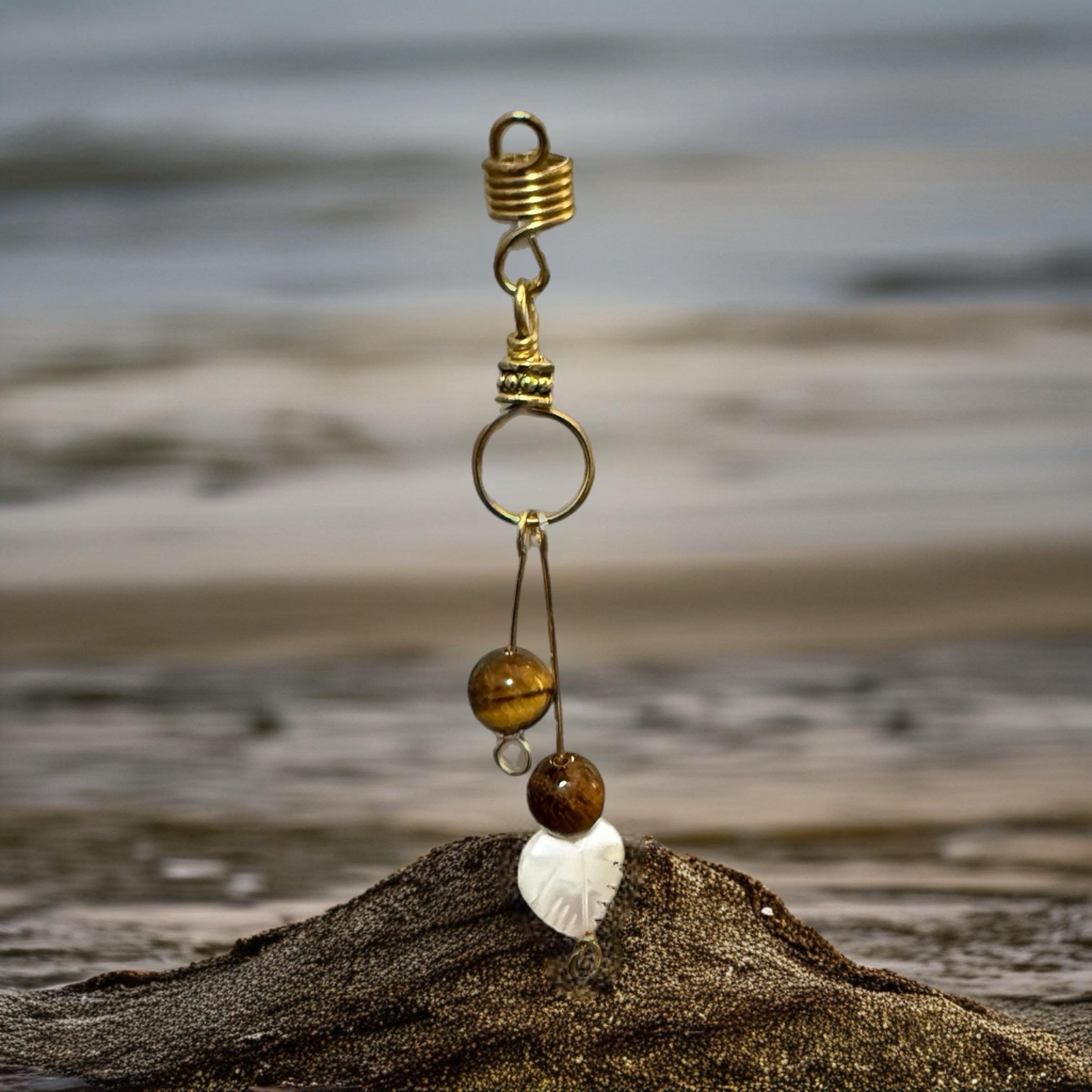 Tiger's eye and shell loc jewelry with gold wire wrapping