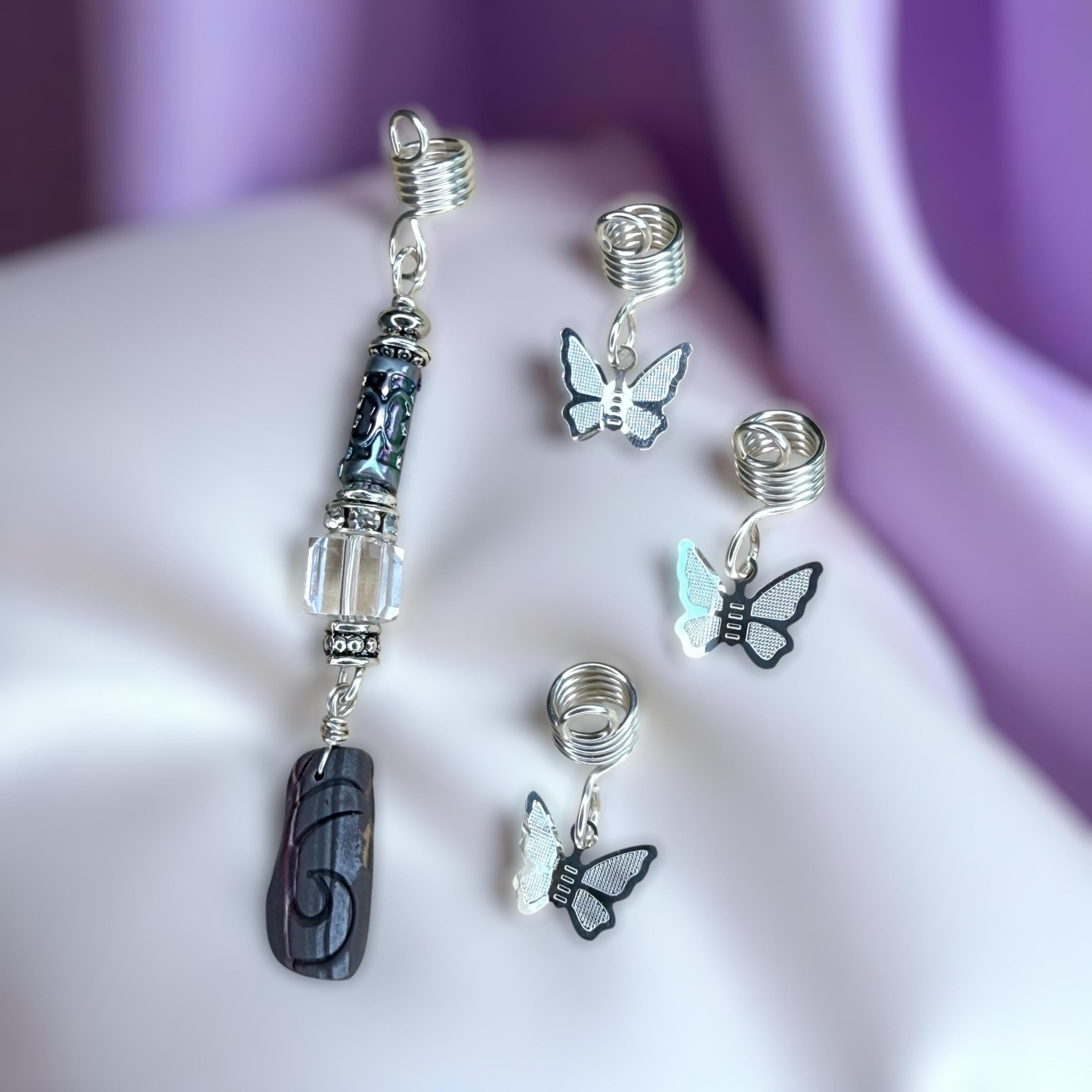 Handmade loc and braid jewelry set with a bird-inspired charm