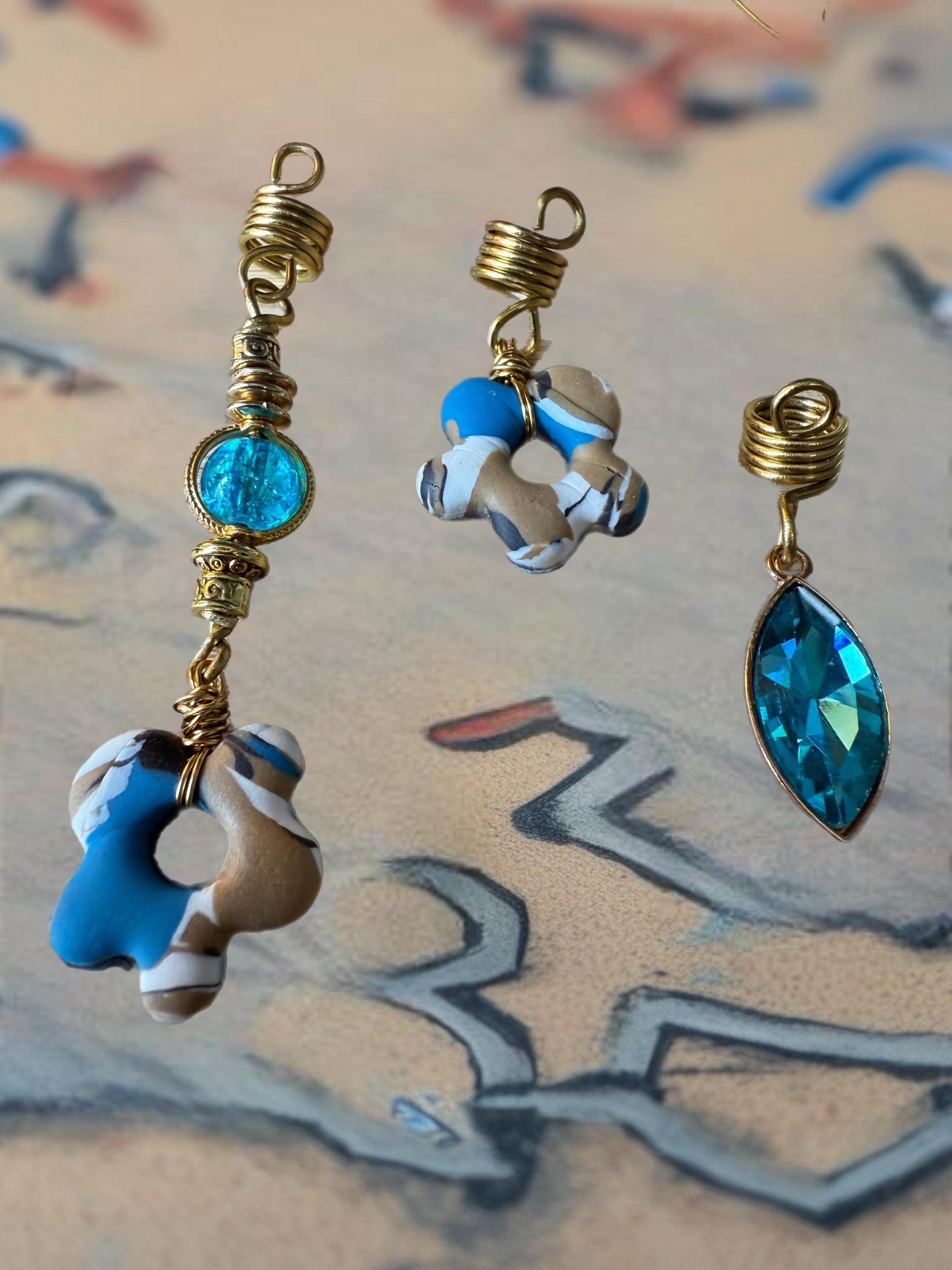 Blue gemstone loc jewelry set with gold wire wrapped details