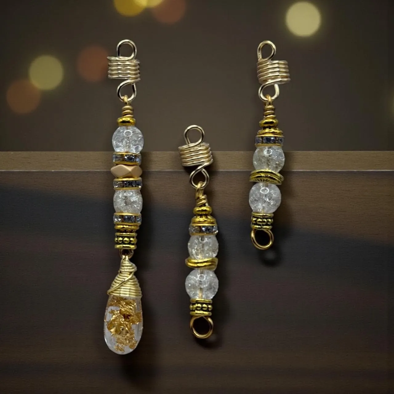 Golden loc jewelry set with crackle-glass beads and wire-wrapped details