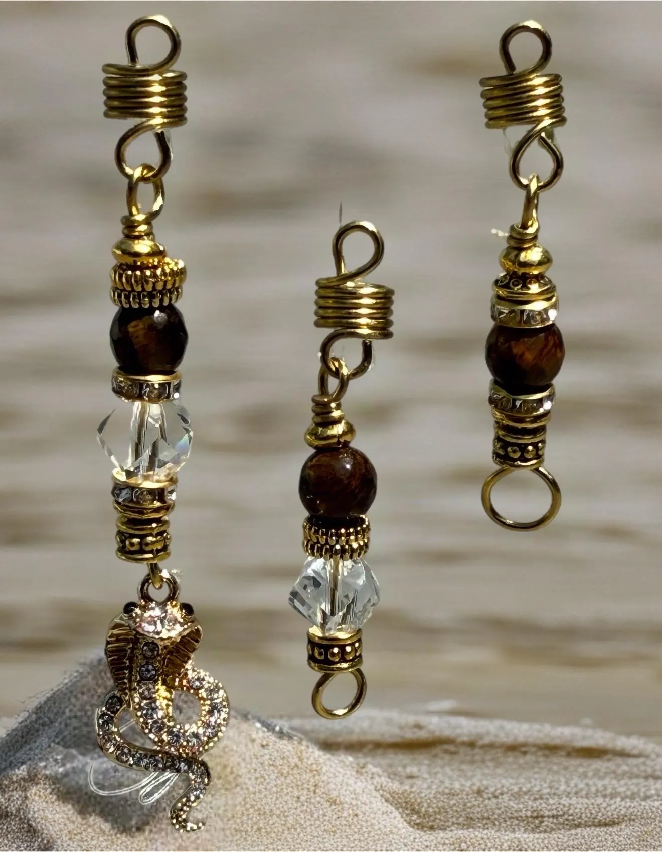 Tiger's eye snake loc jewelry with gold-tone coil detail