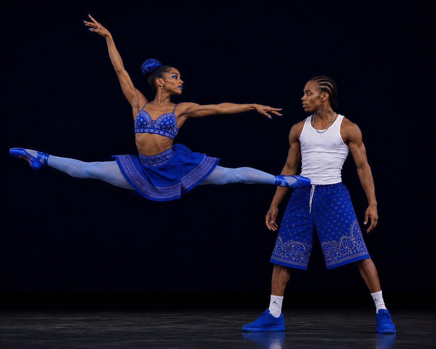 A LAX BLaaK ballerina in blue performance styling leaping across the stage